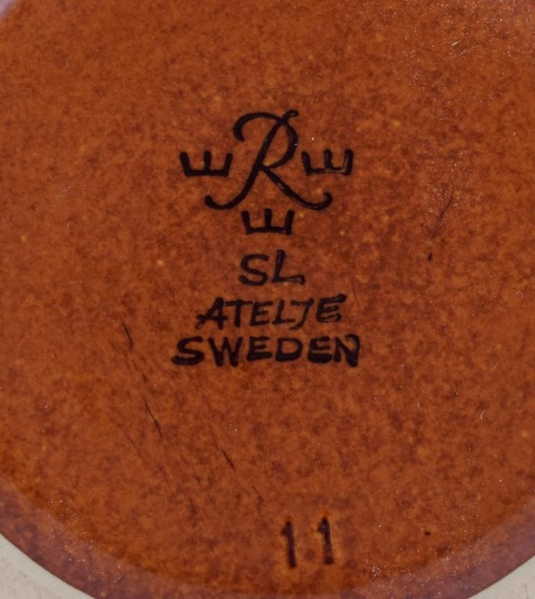Late 20th Century Sylvia Leuchovius for Rörstrand Atelje. Ceramic pot in brown glaze.  For Sale
