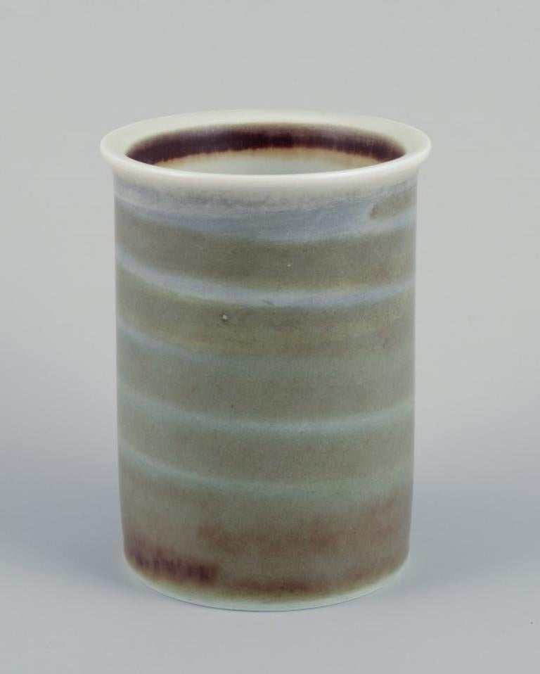 Sylvia Leuchovius (1915-2003) for Rörstrand. 
Ceramic vase with glaze in green and blue tones.
1960s/70s.
Marked.
In perfect condition.
First factory quality.
Dimensions: H 11.7 x D 8.6 cm.
