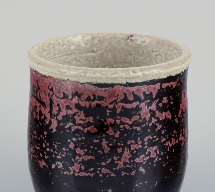 Scandinavian Modern Sylvia Leuchovius for Rörstrand. Ceramic vase with dark-toned glaze. For Sale