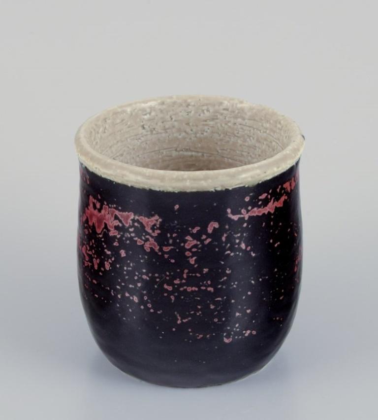 Swedish Sylvia Leuchovius for Rörstrand. Ceramic vase with dark-toned glaze. For Sale