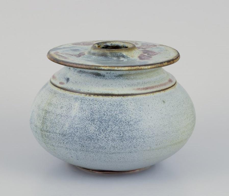 Sylvia Leuchovius (1915–2003), her own workshop. 
Large unique ceramic vase. Glaze in shades of blue and green.
1970s.
Signed.
Perfect condition.
Dimensions: Diameter 16.0 cm x Height 12.0 cm.