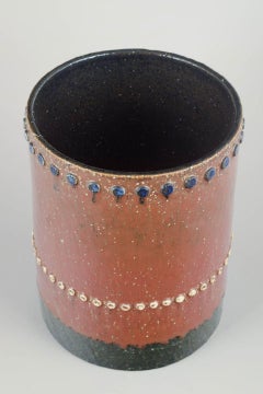 Sylvia Leuchovius, Rörstrand. Cylindrical stoneware vase with studs. Mid-20th C.