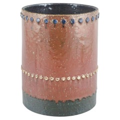 Sylvia Leuchovius, Rörstrand. Cylindrical stoneware vase with studs. Mid-20th C.