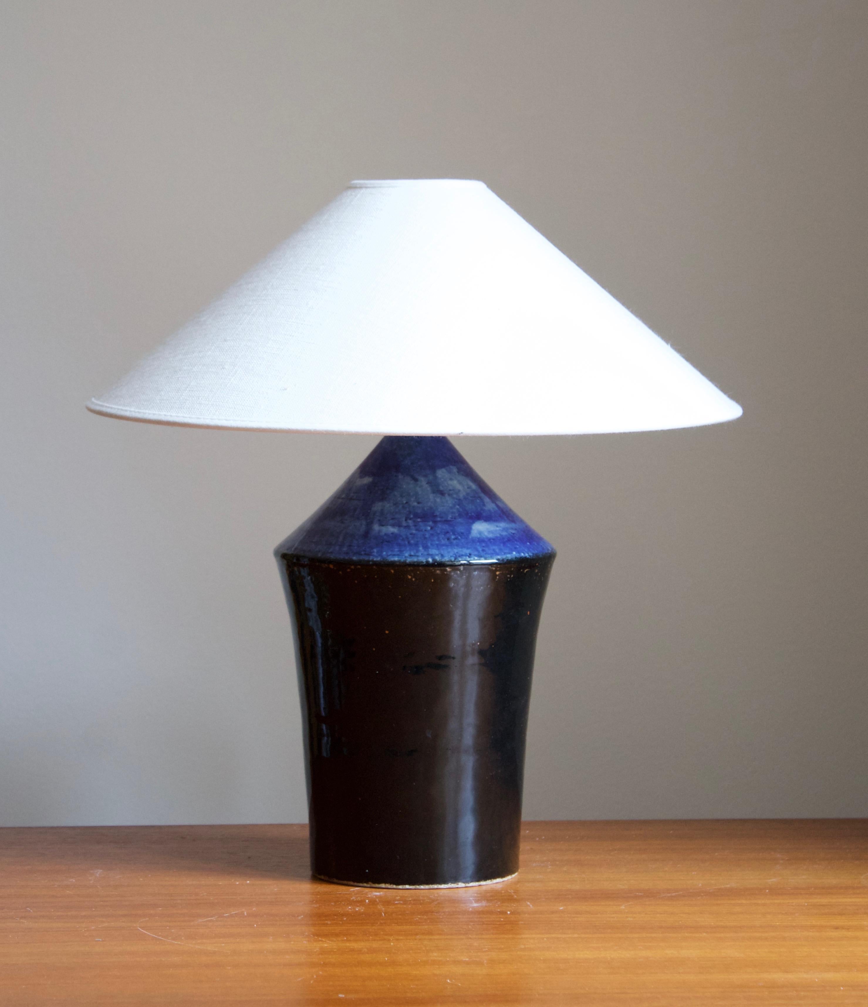 A rare stoneware table lamp designed by Sylvia Leuchovius, produced by Rörstrands, signed and dated 1979. From the rare production at Rörstands named 