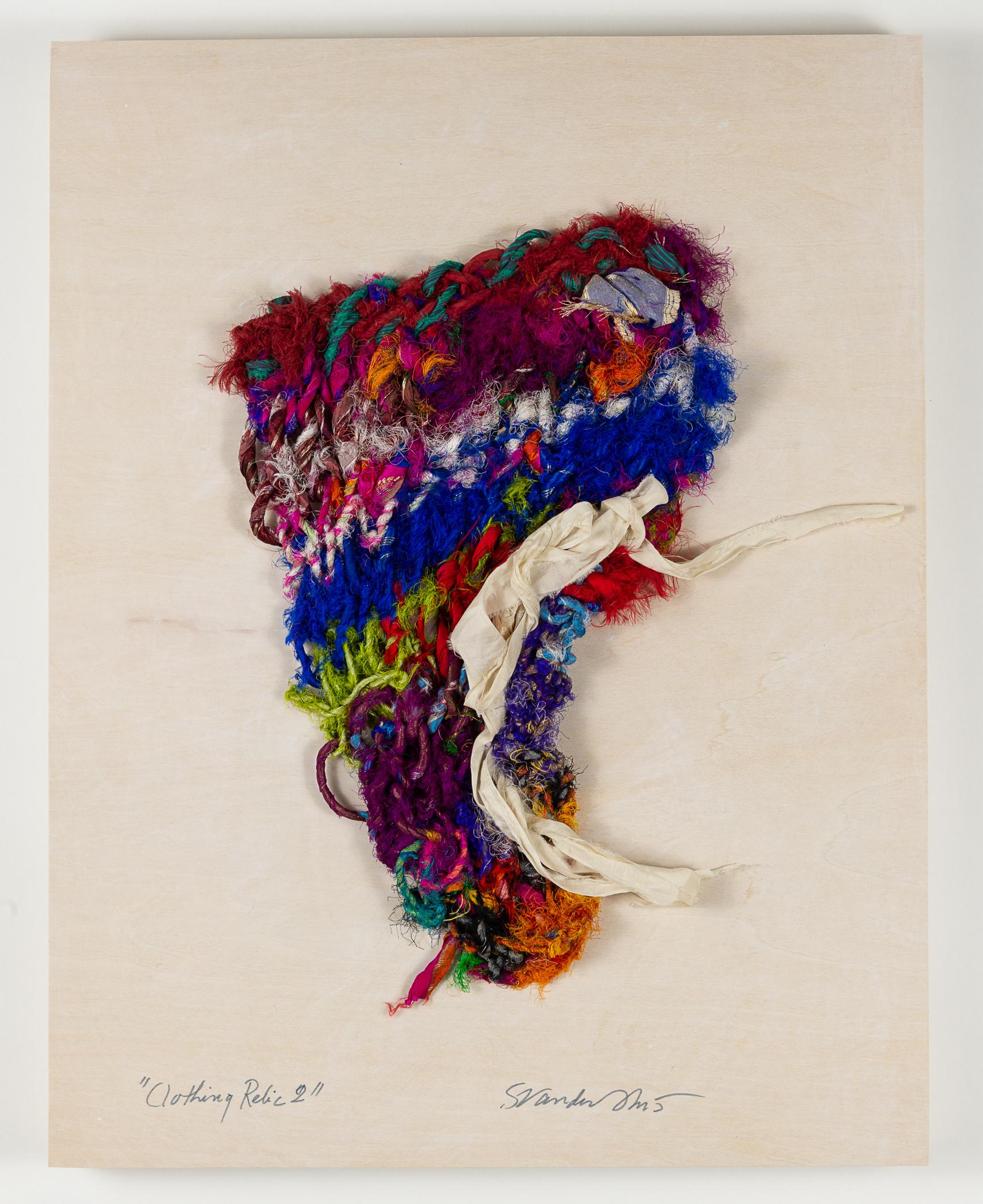 "Clothing Relic 2", fiber, silk, hand knit, red, blue, ivory, sculpture - Art by Sylvia Vander Sluis