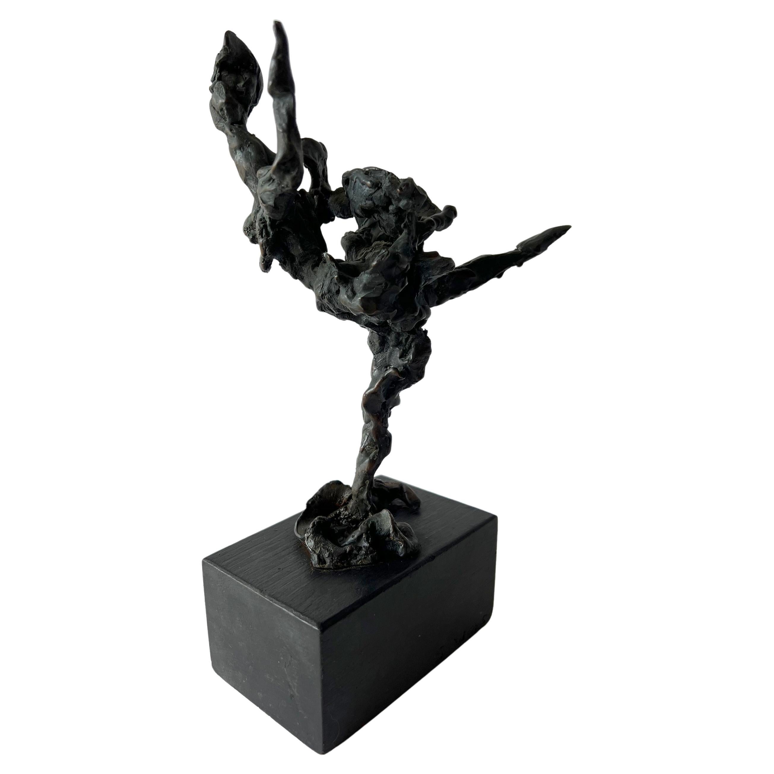 Hand sculpted bronze dancer sculpture created by listed artist Sylvia Weiss of Chicago, Illinois. Sculpture measures 9.5