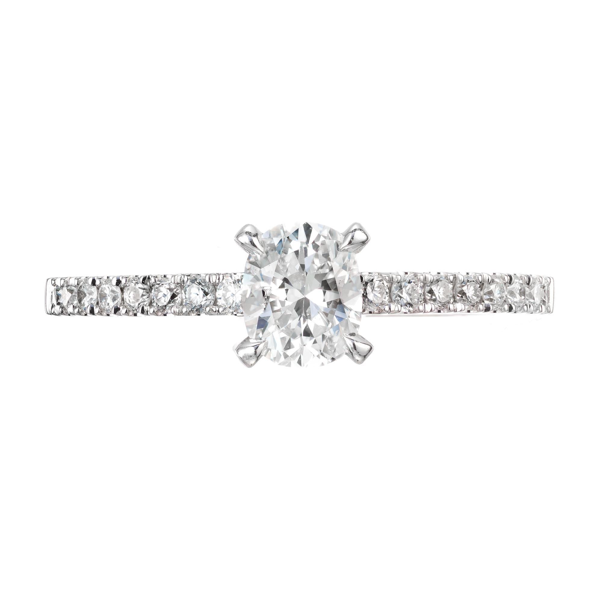 Sylvie Oval diamond engagement ring. 14k white gold setting with 16 round accent diamonds.  EGL certified. 

1 oval diamond, approx. total weight .55cts, G to H, SI1, 5.58 x 4.53 x 3.10mm, EGL certificate # US67012003D
16 full cut round diamonds,