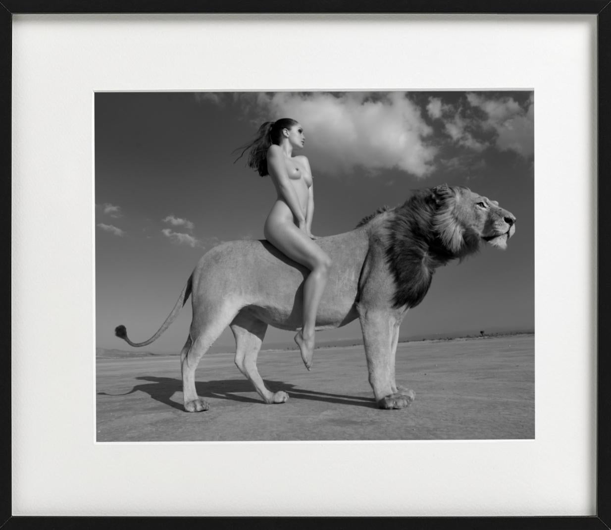 woman riding lion