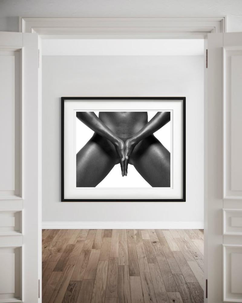 A Woman holding her hand over her body, black and white, photographed by Sylvie Blum in 2008.

All prints are limited edition. Available in multiple sizes. High-end framing on request.

All prints are done and signed by the artist. The collector