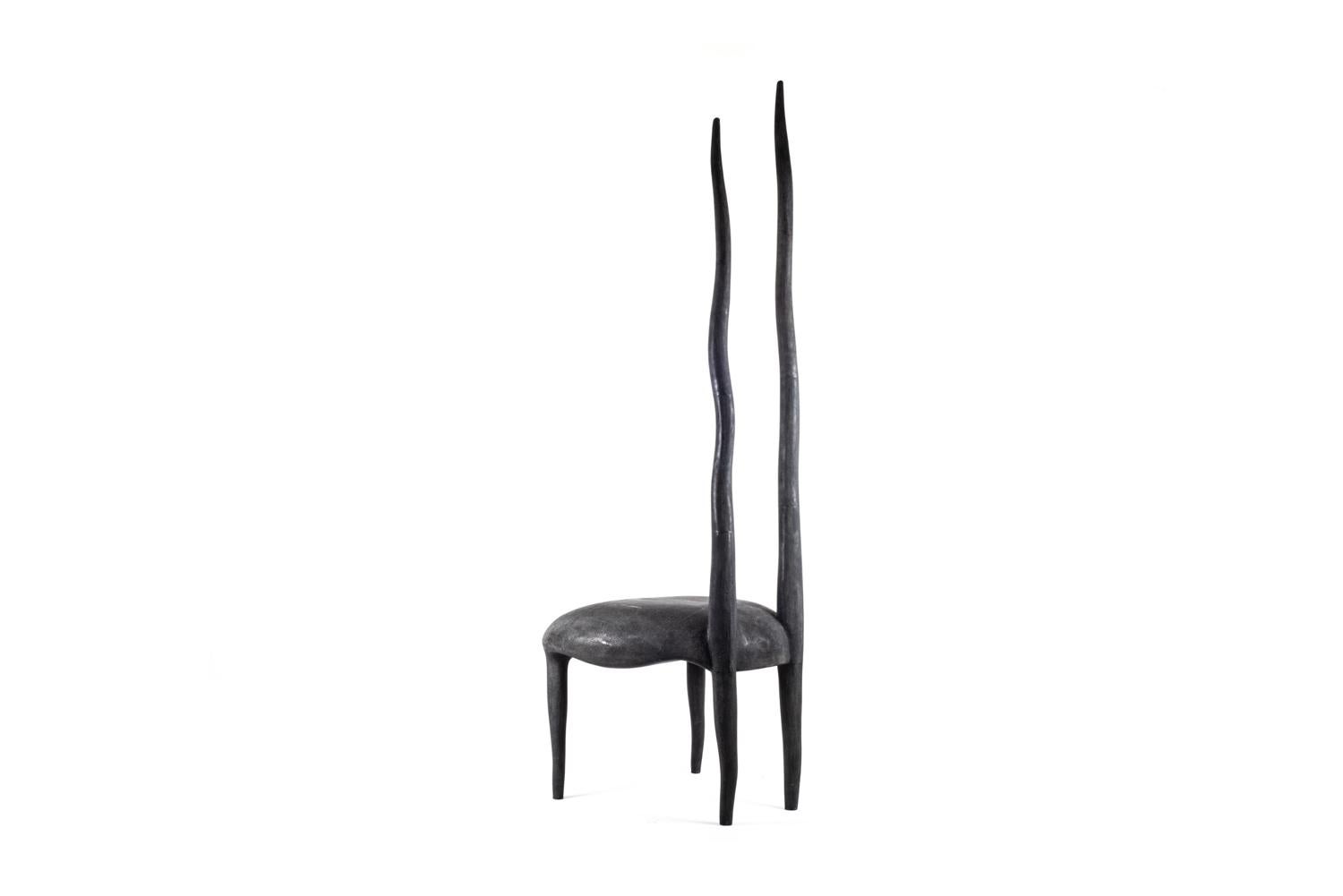 The Sylvie chair is an iconic design by R & Y Augousti. One of their very first designs, this majestic and ethereal piece is a statement in any space. This piece has been photographed in numerous celebrity homes, including design Alexander Wang's