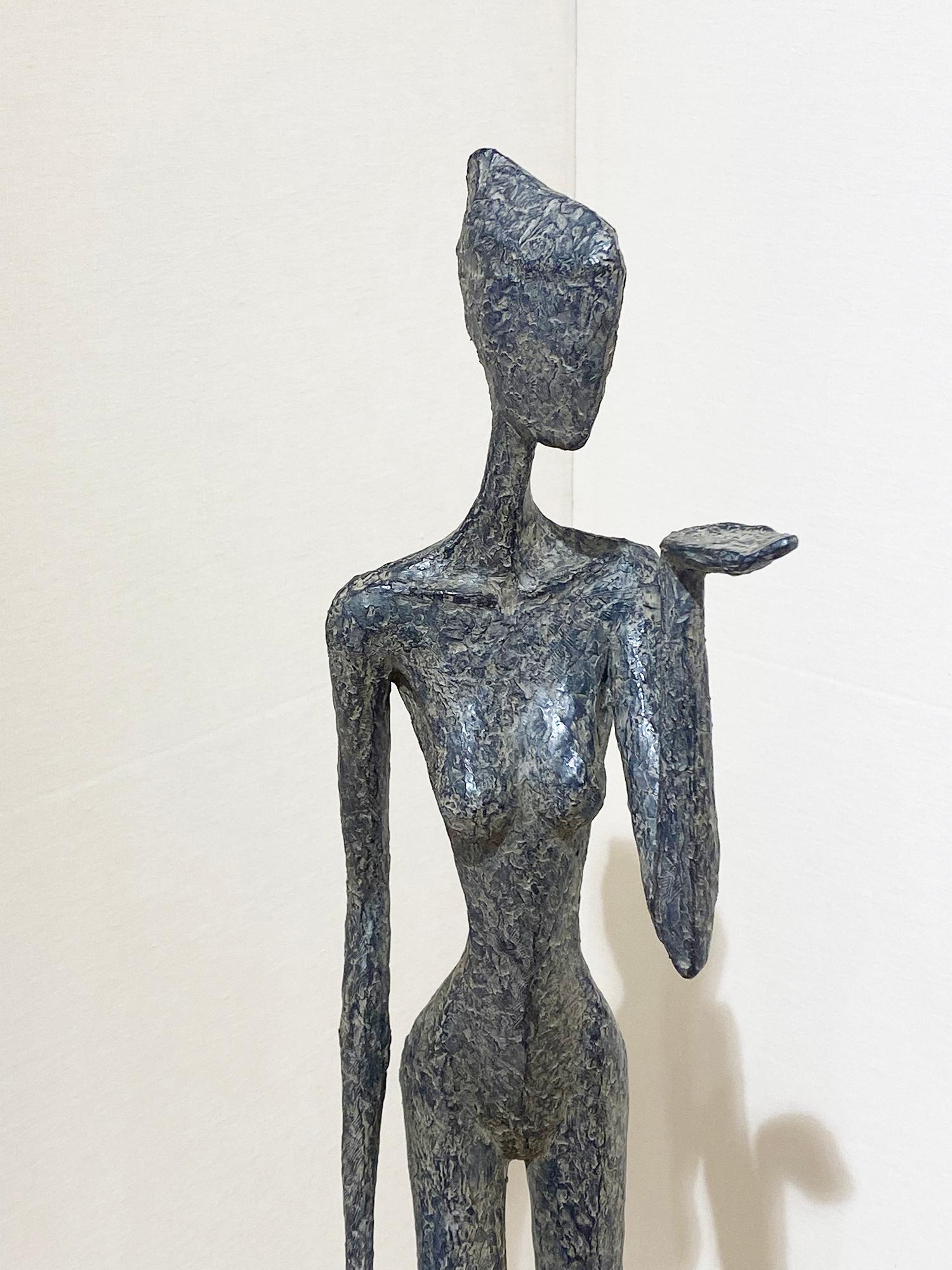 Sentiment is a nude bronze by the French contemporary artist, Sylvie Mangaud.
Edition 2/8 and signed SML on the base with founder stamp.

Sylvie Mangaud seems to sculpt the vibrancy that emanates from the female body in motion. Whether it is a