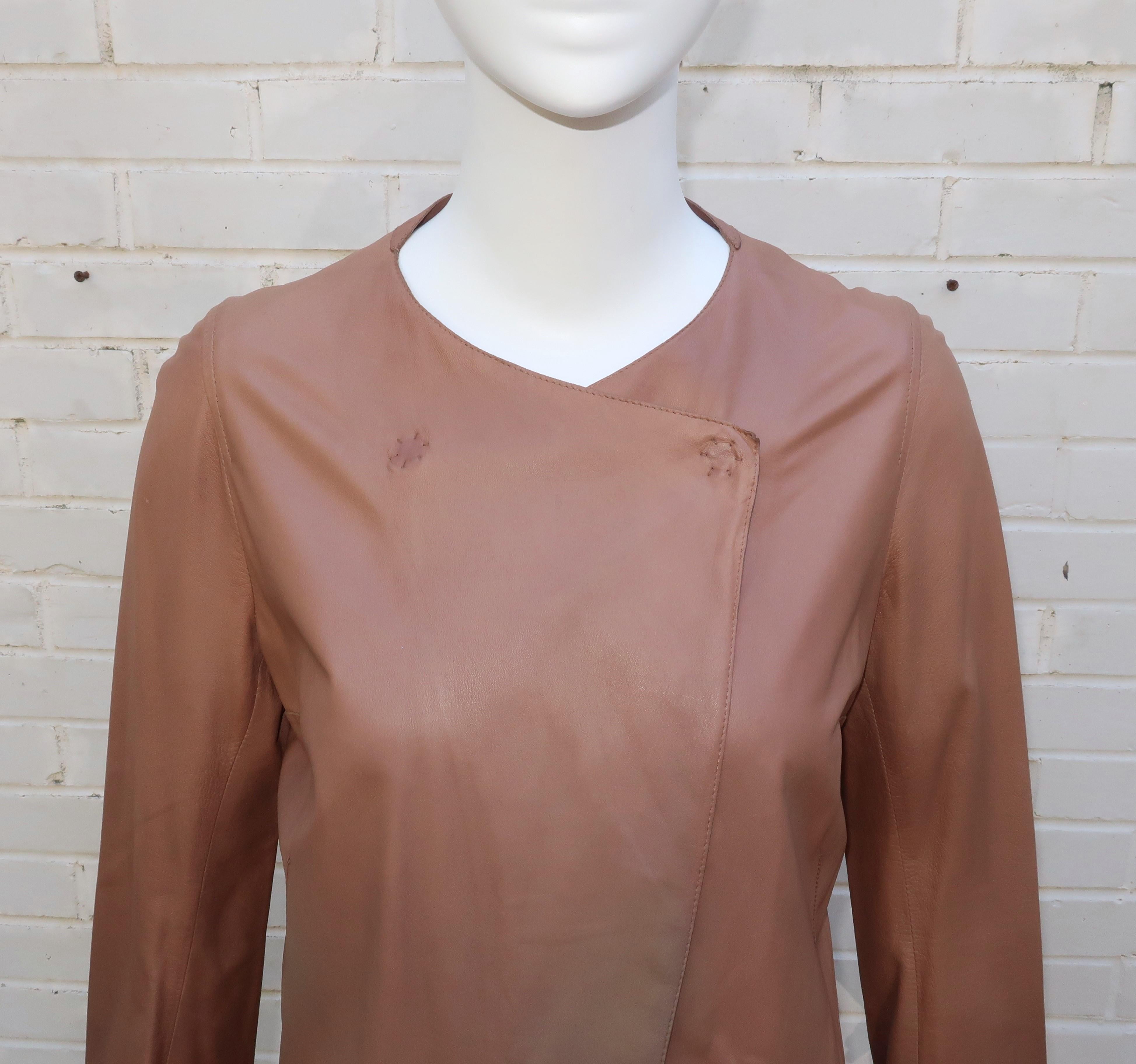 Contemporary sculptural leather jacket by Sylvie Schimmel in a putty toned cognac color.  There is also a hint of bronze which gives the jacket a very subtle sheen.  It is designed to be fitted across the shoulder, bust and arms with two snaps at