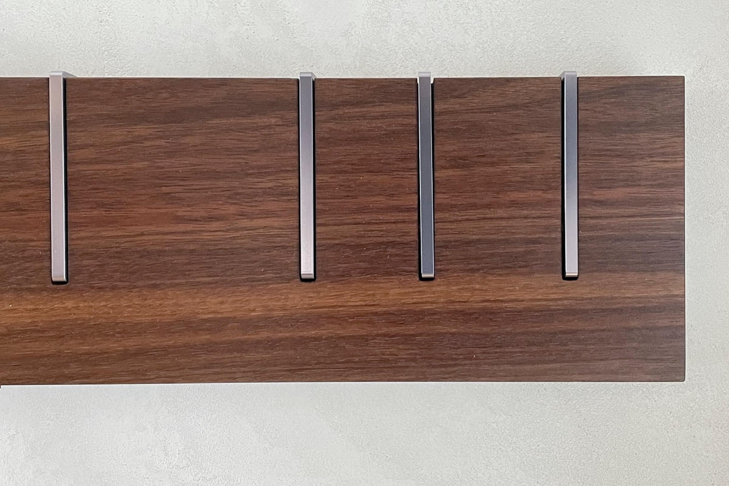Symbol X is an ongoing exploration into rendering our iconic symbol coat rack in new materials and finishes. With limited, small batch productions each unit is one of a kind. The photos on this page are of the exact coat rack you will receive,