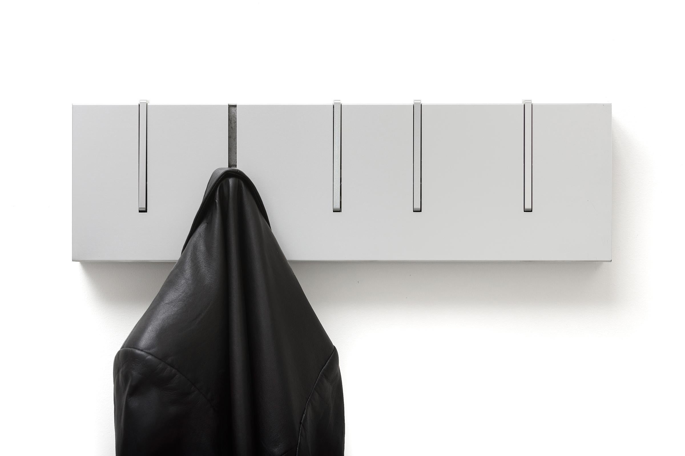 The Symbol 20 offers everything our classic Symbol Coat Rack does, now in a shorter length to fit in more places. This modern coat rack functions both a practical storage option and as wall art. During the summer months the Symbol 20 in MONOCHROME