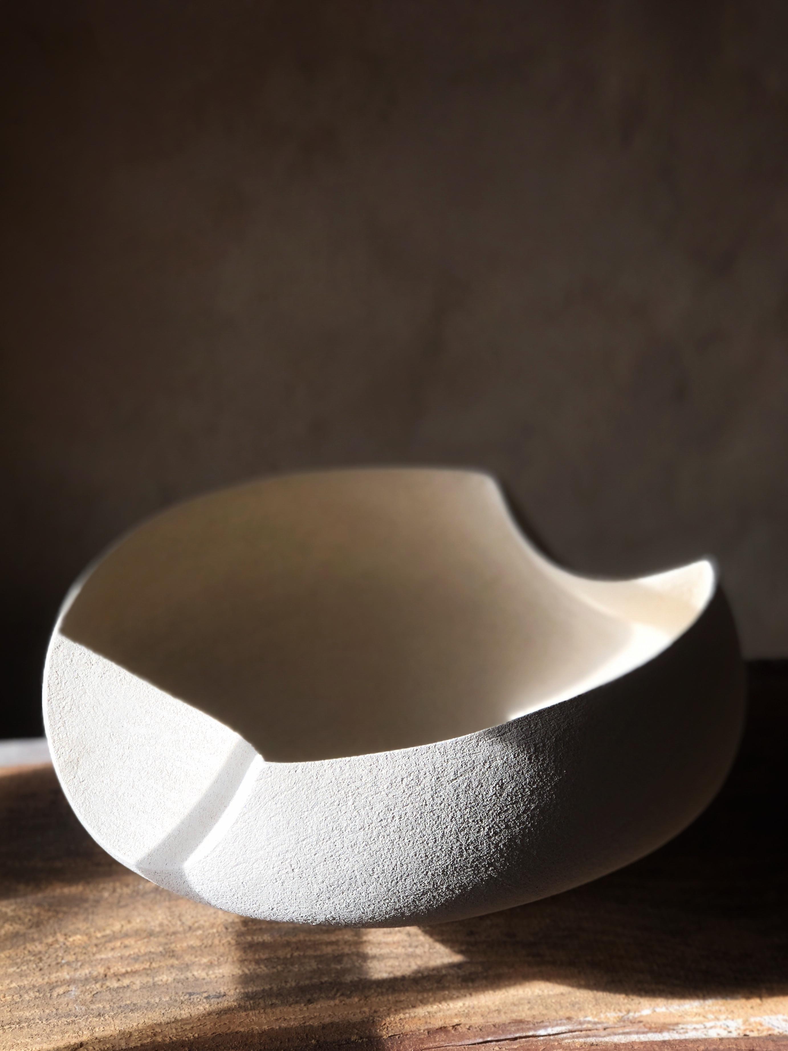 Symétrical Bowl 02 by Sophie Vaidie
One Of A Kind.
Dimensions: D 35 x W 38 x H 20 cm. 
Materials: Brutal Beige stoneware with fine chamotte.

In the beginning, there was a need to make, with the hands, the touch, the senses. Then came the desire to