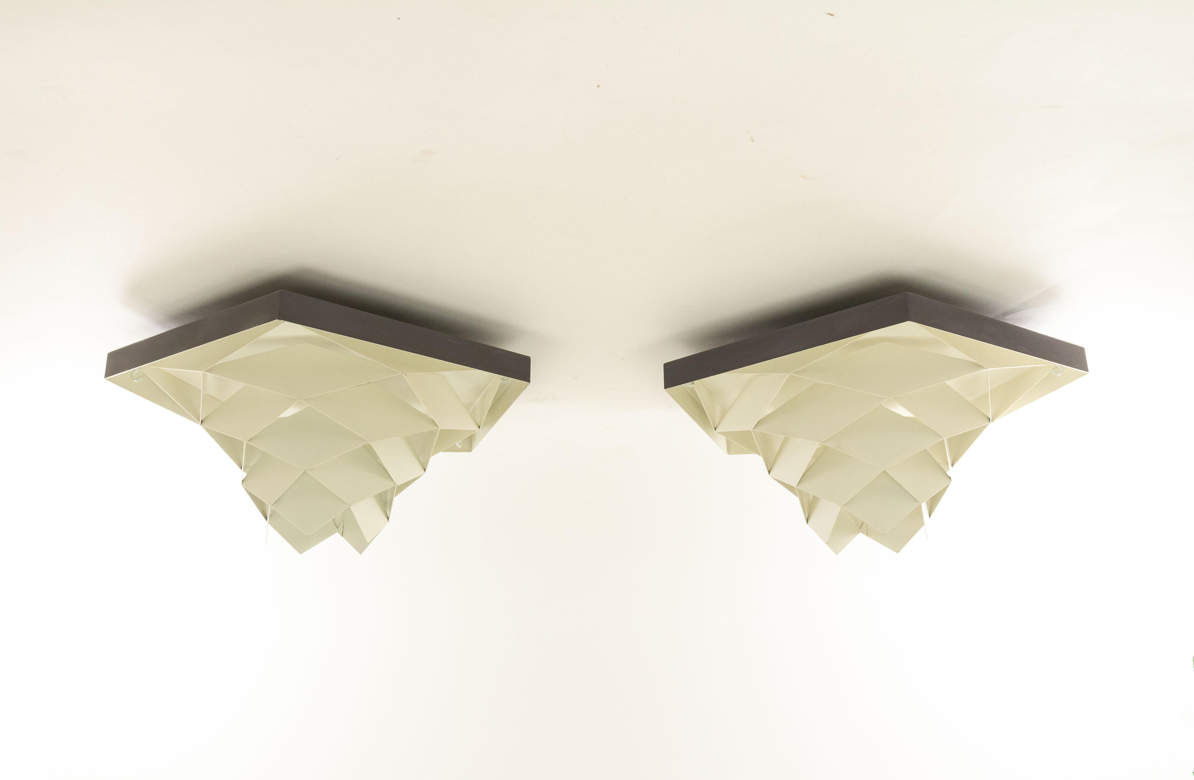 Danish midcentury Symfoni ceiling lights designed by Preben Dahl in the early 1960s and produced by Hans Følsgaard Belysning.

The model is part of the Symfoni lighting series, consisting of ceiling lights and pendants made of white and