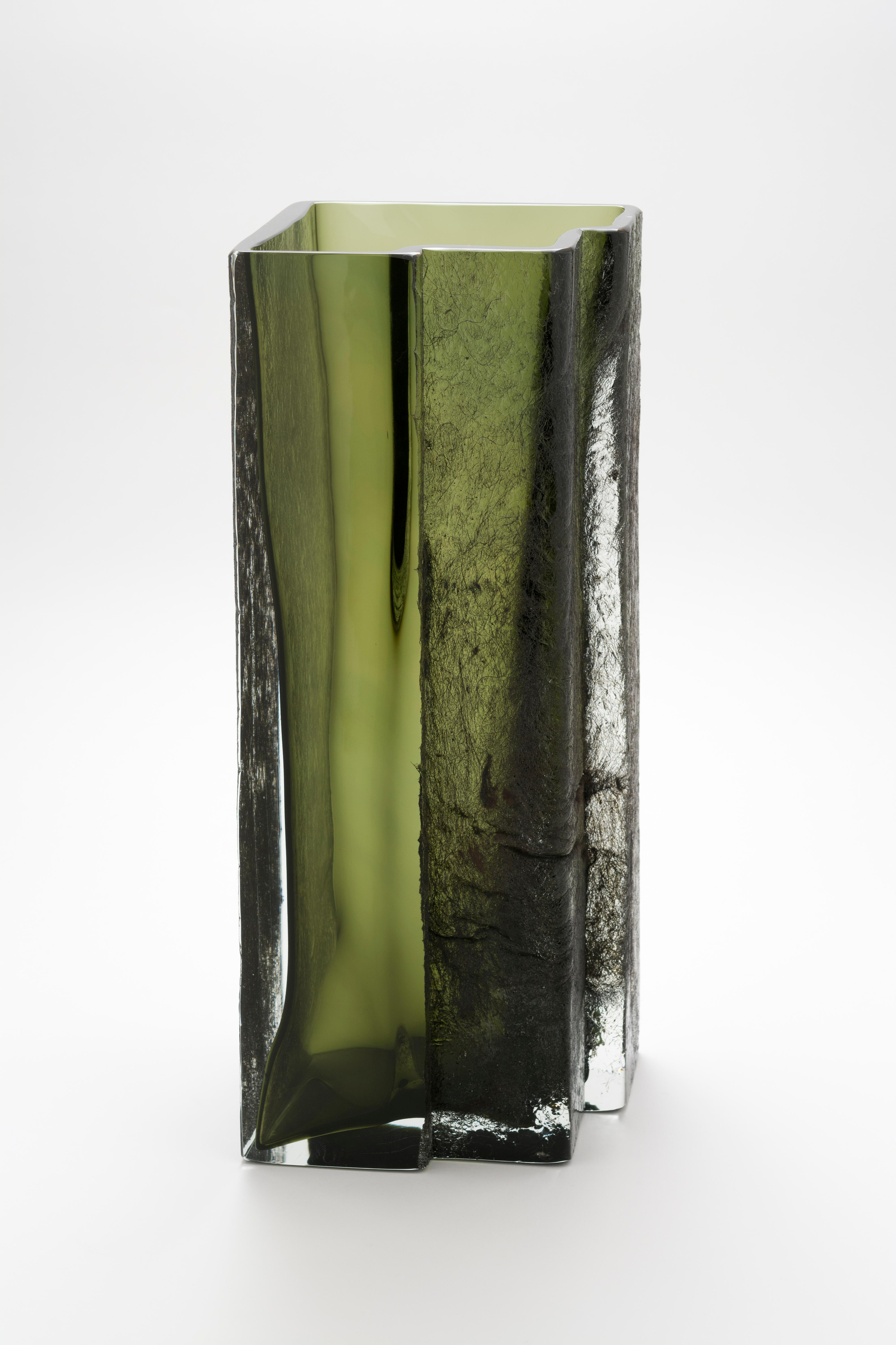 Symmetria vase by Paolo Marcolongo
Limited edition. 
Dimensions: 42.1 x 16.5 x H 16 cm 
Materials: Murano glass and iron. 


Paolo Marcolongo was born in Padua in 1956, he attended the Art High School 