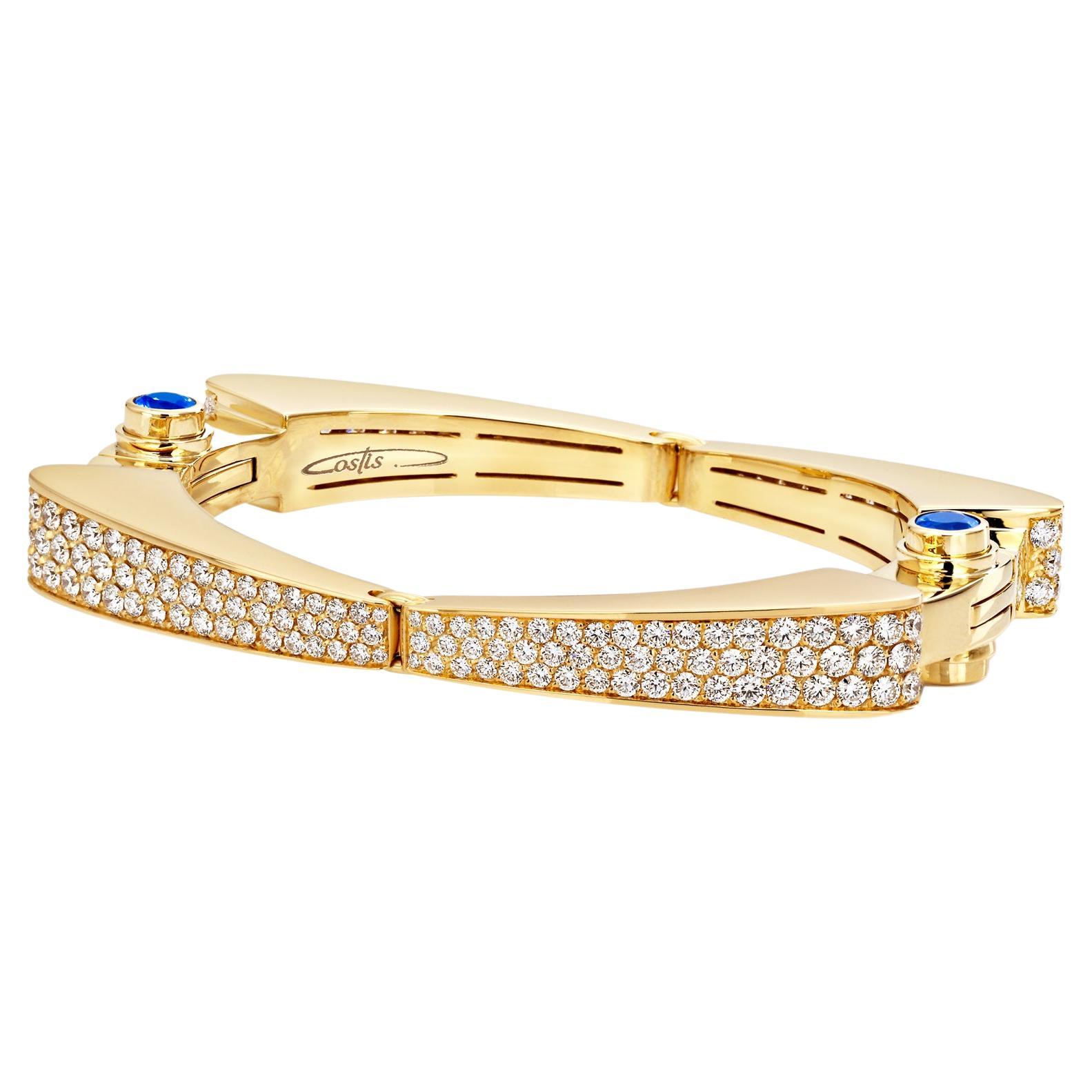 Manchette « Costis » symétrique avec diamants et saphirs bleus royaux de Ceylan en vente
