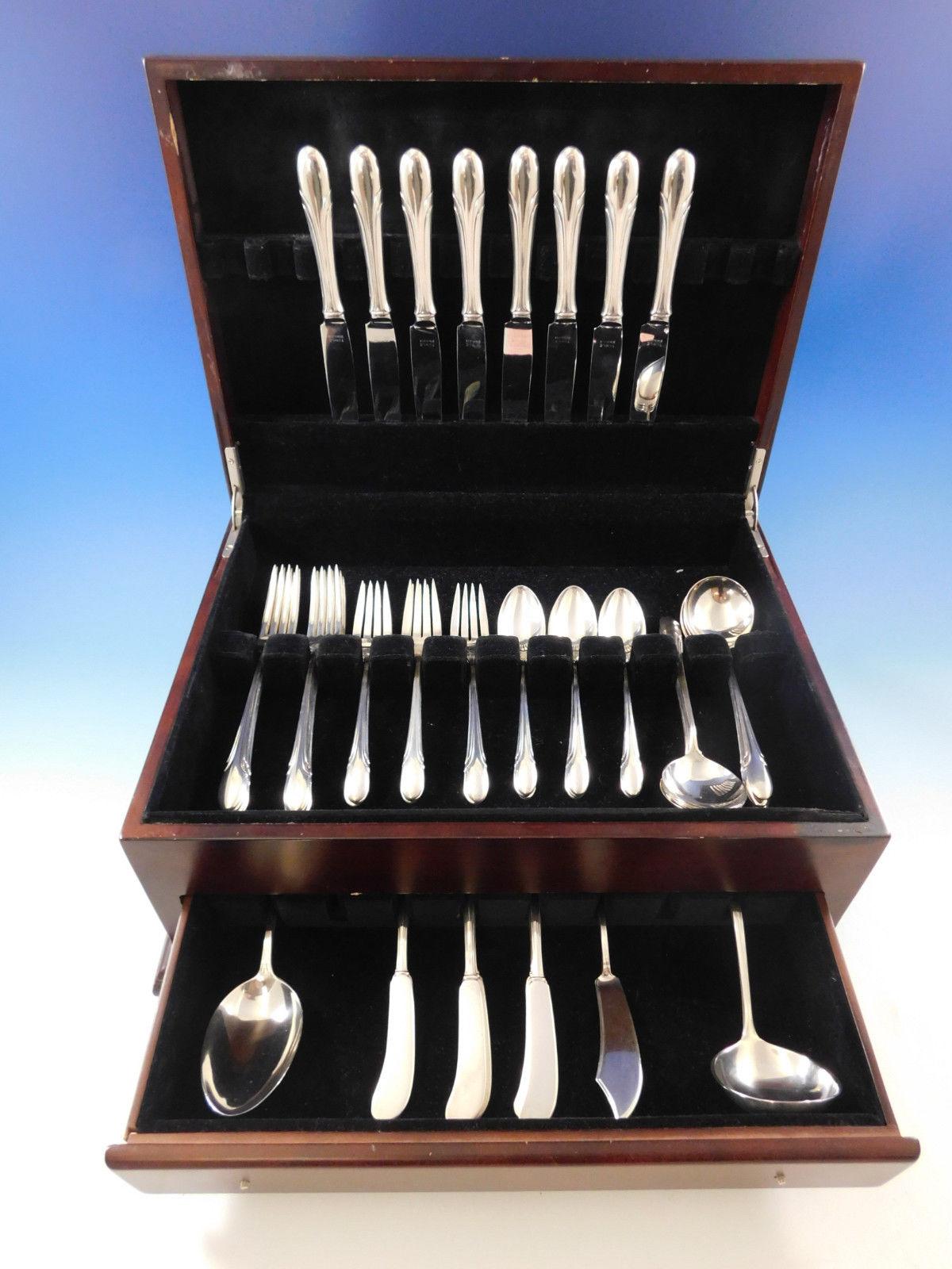 Symphony by Towle sterling silver Flatware set, 51 pieces. This set includes:

Eight knives, 8 7/8