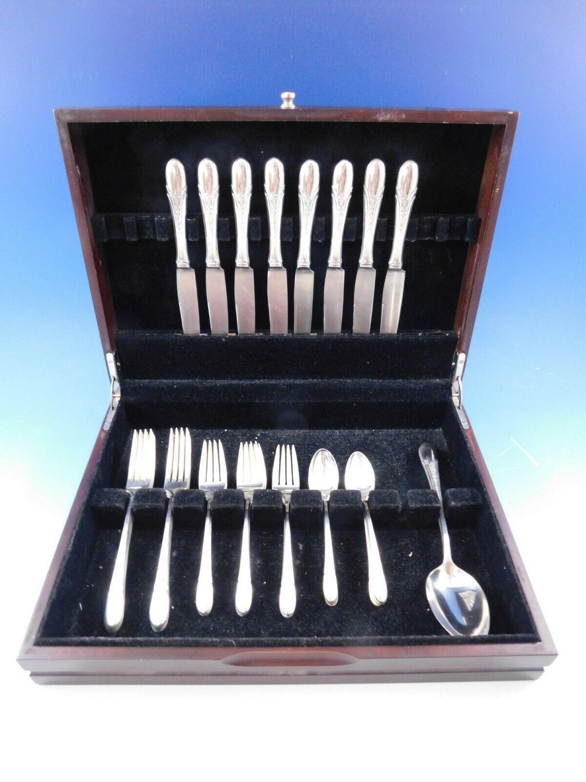 Symphony chased by Towle circa 1934 sterling silver Flatware set, 34 pieces. This set includes:

8 knives, 9 1/4