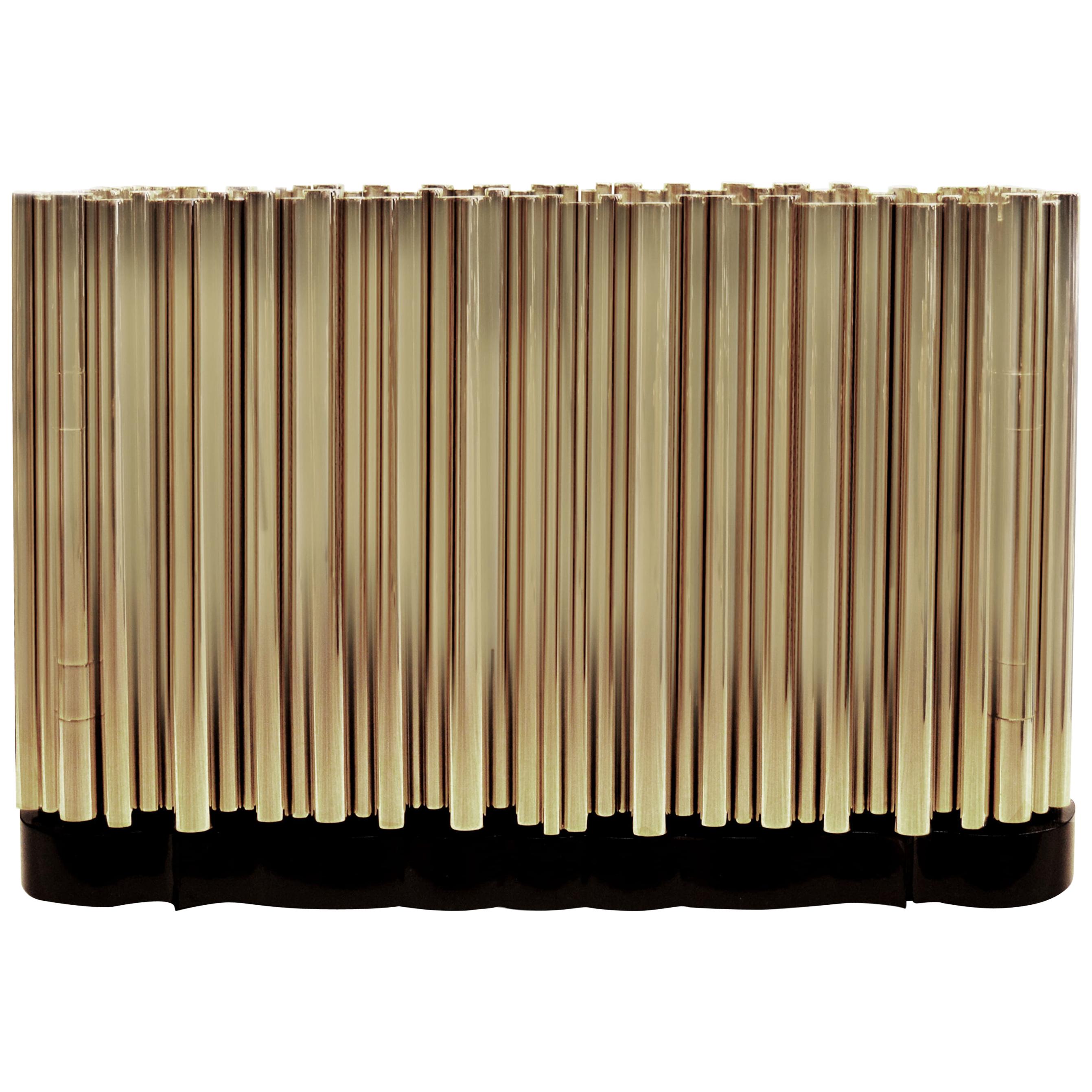 The Symphony sideboard is a statement piece whose modern design emulates the grandeur of classic church organ pipes. Synonym of innovation and flawless execution, the Symphony is one of the most exquisite pieces to grace the Limited Edition