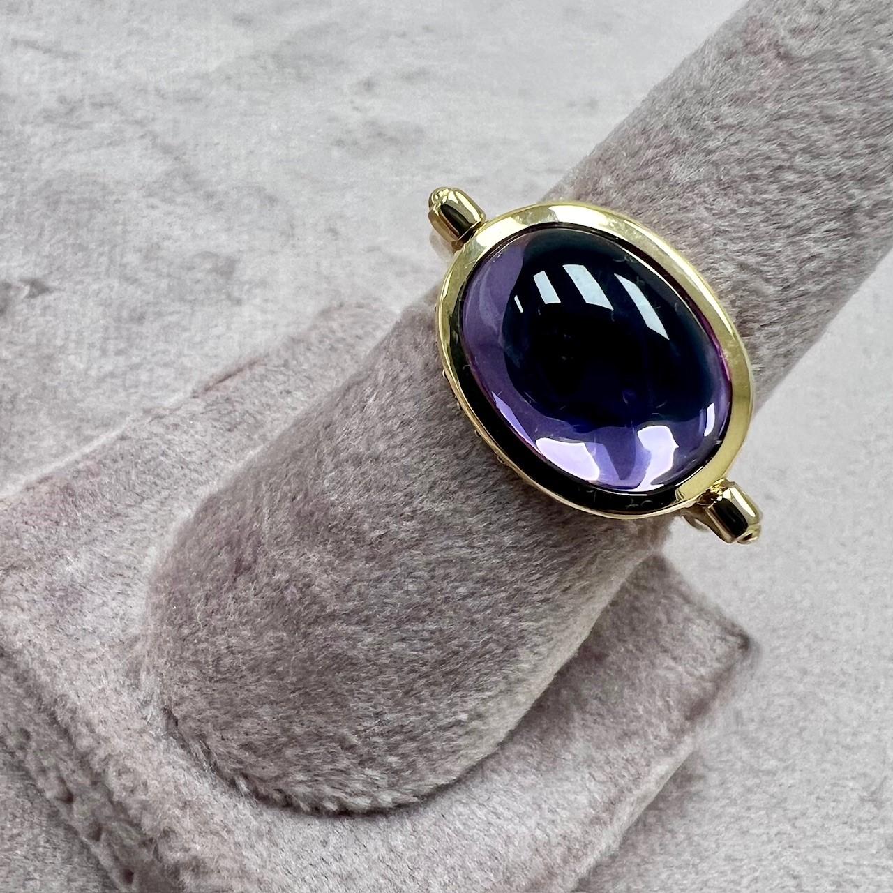 Created in 18 karat yellow gold
Amethyst 5 carats approx.
Diamonds 0.30 carat approx.
Ring size US 6.5, can be sized as per request
Swivel mechanism

Stunningly crafted in 18 karat yellow gold, this ring features an Amethyst 5 carats approximate