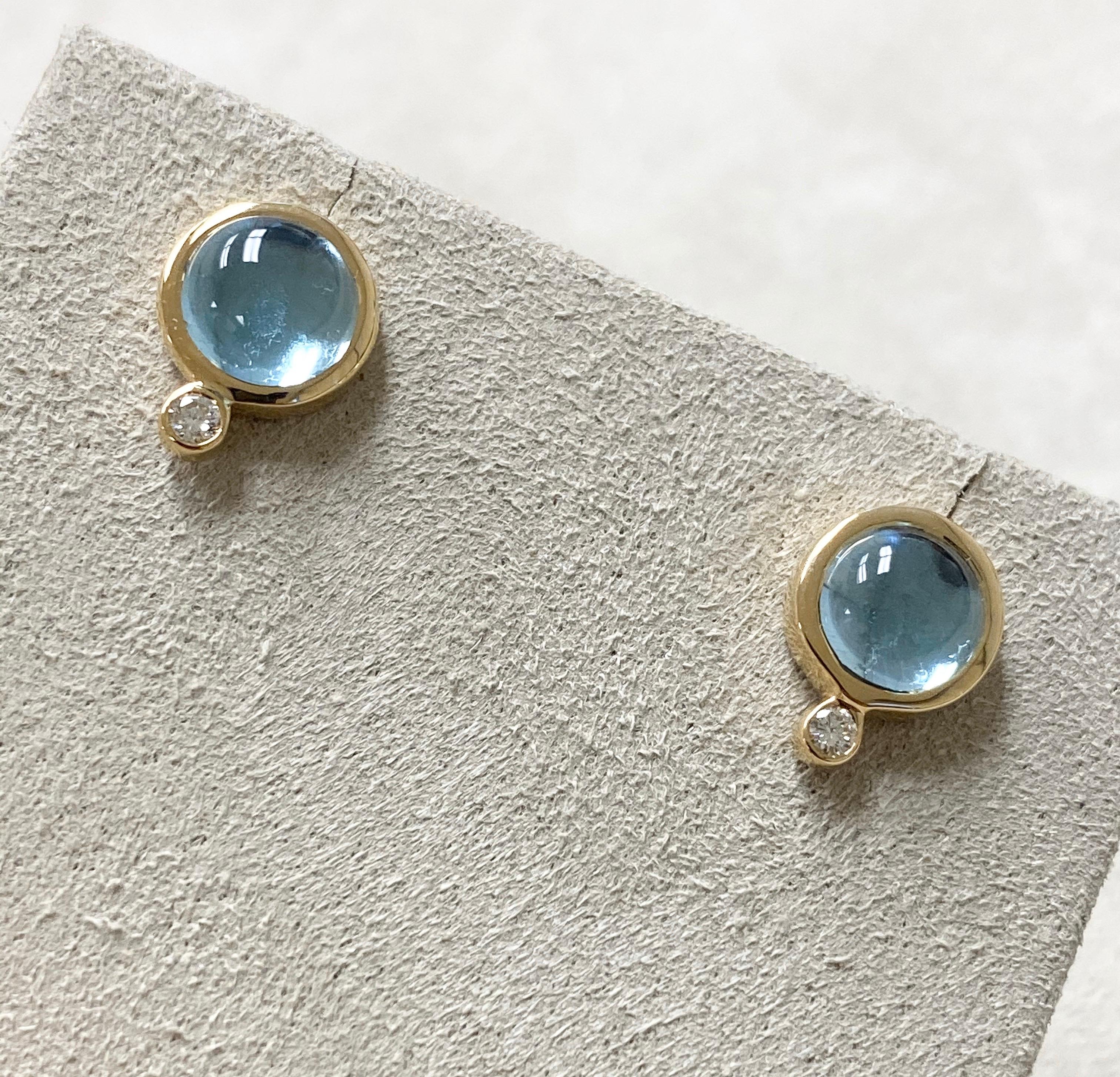 Created in 18 karat yellow gold
Blue topaz 4 cts approx
Diamonds 0.10 ct approx
Can be worn at different angles
Limited edition

Pure elegance in a limited edition design, these 18 karat yellow gold earrings feature a captivating 4ct Candy Blue