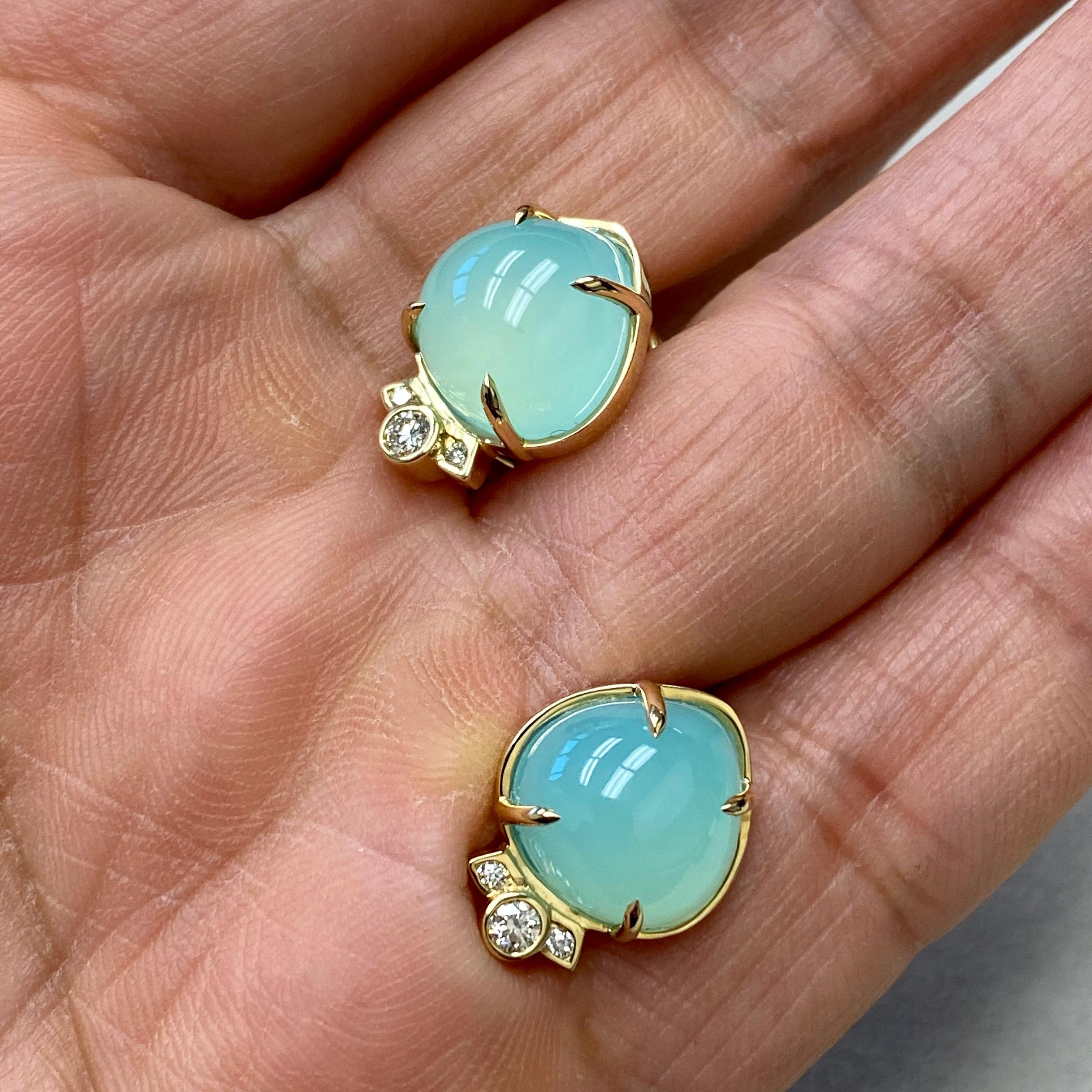 Created in 18 karat yellow gold
Sea Foam Green Chalcedony 14 cts approx
Diamonds 0.15 cts approx
Omega clip-backs & posts
Limited Edition

Take your look to the next level with these exquisite, limited edition Candy Blue Topaz & Diamond earrings.