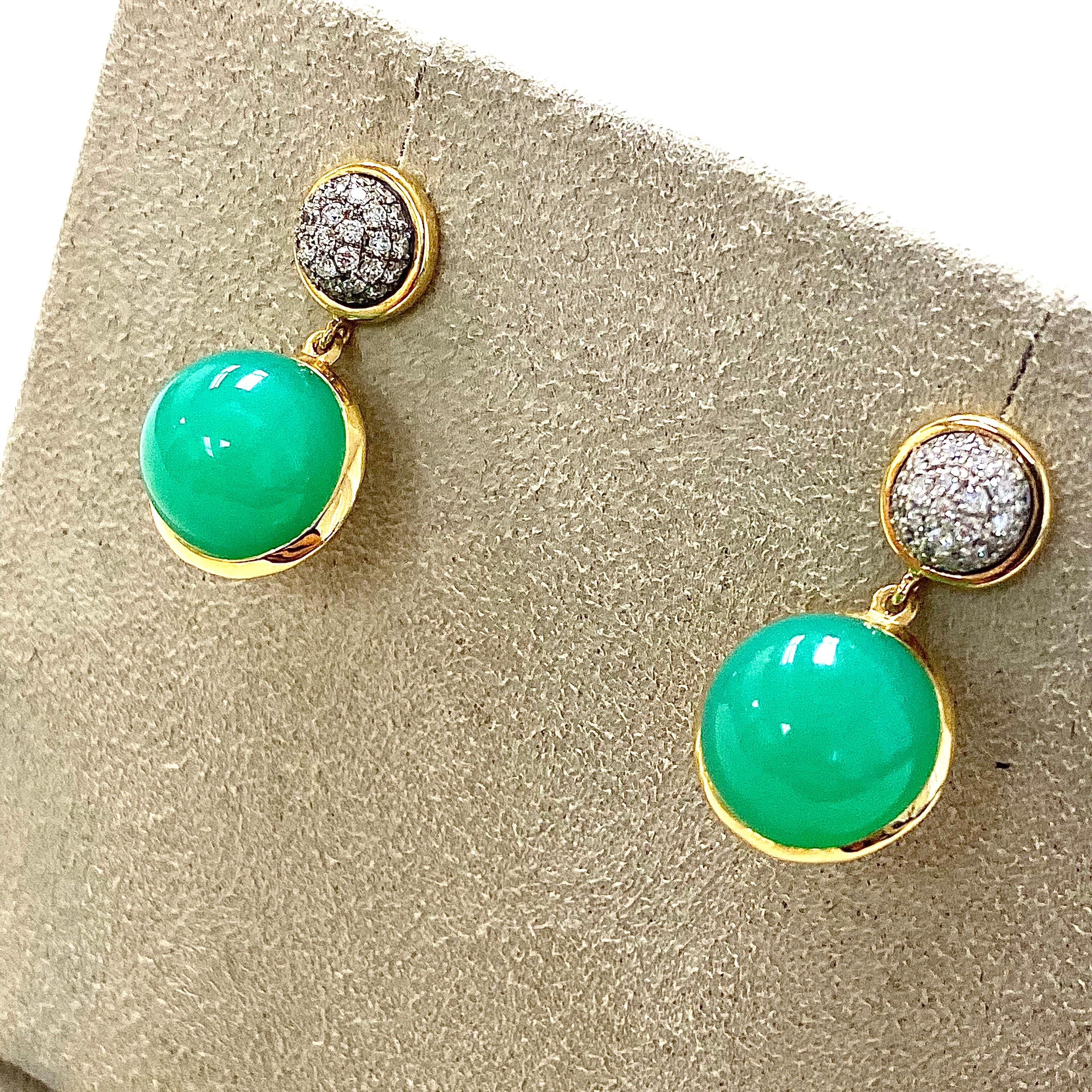 Created in 18 karat yellow gold
Chrysoprase 15 cts approx
Diamonds 0.50 ct approx

Candy Blue Topaz & Diamond Earrings make for a dazzling addition to any jewelry collection. Crafted with 18 karat yellow gold, these earrings are encrusted with
