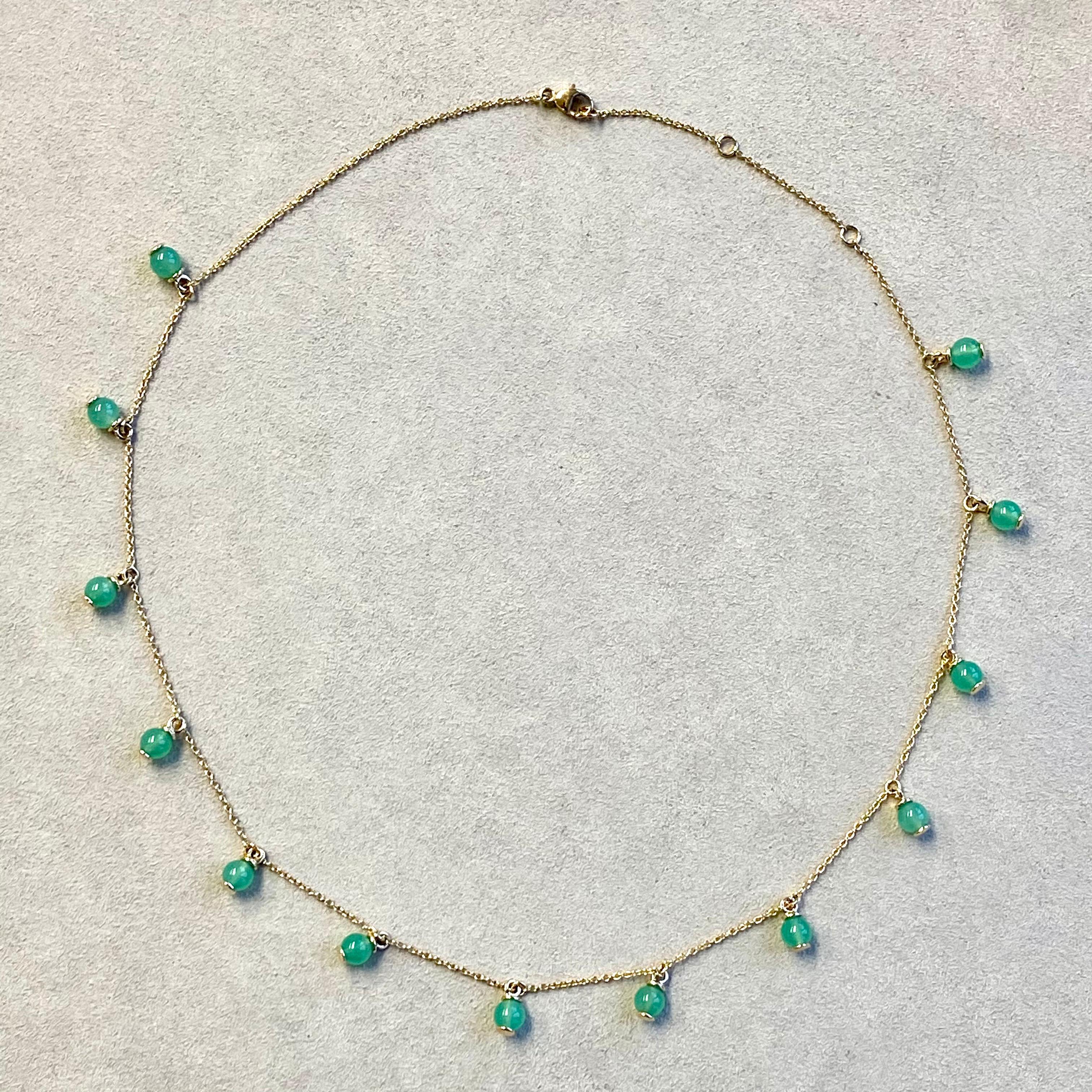 Created in 18 karat yellow gold
18 inch length
Chrysoprase beads 11 carats approx.
18kyg lobster clasp
Limited edition

Ensconced in 18 karat yellow gold, this limited edition necklace boasts an 18 inch chain and boasts 11 carats of chrysoprase