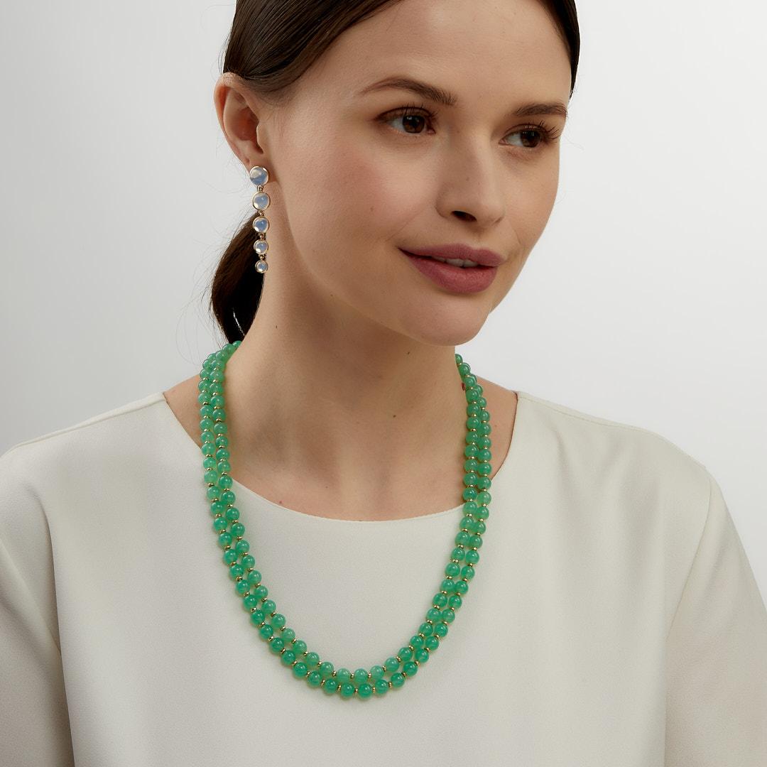 Created in 18 karat yellow gold
Two strands, 22 inches each
Chrysoprase 130 carats approx.
18kyg roundels 
18kyg circle clasp with diamond
Strung on silk
Limited edition

Exquisitely handcrafted from 18 karat yellow gold, this limited edition