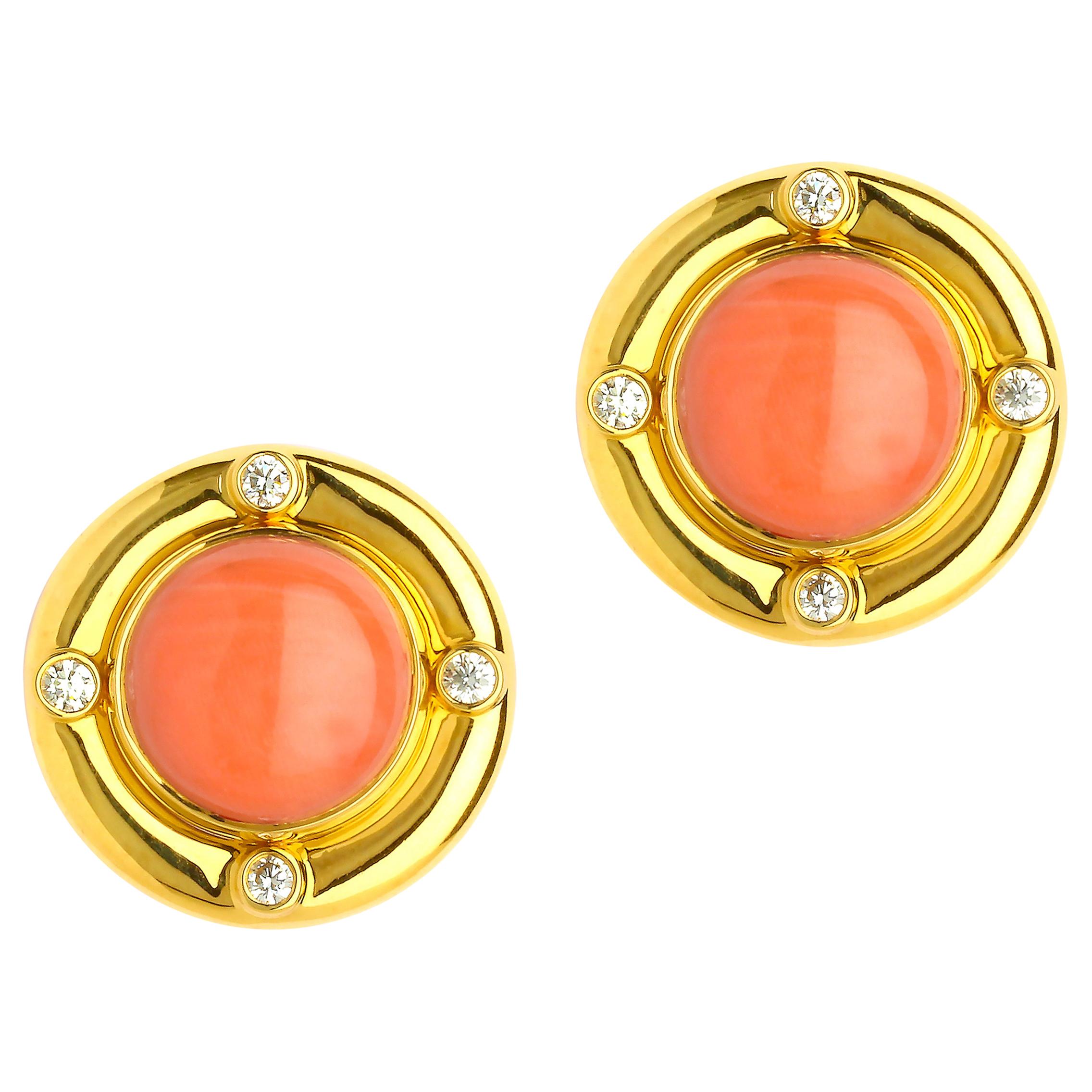 Created in 18 karat yellow gold
Large natural salmon colored coral cabochons
Diamonds 0.85 carat approx,
Limited edition

These exclusive Candy Blue Topaz & Diamond Earrings are handcrafted from 18 karat yellow gold for an exquisite look that stands