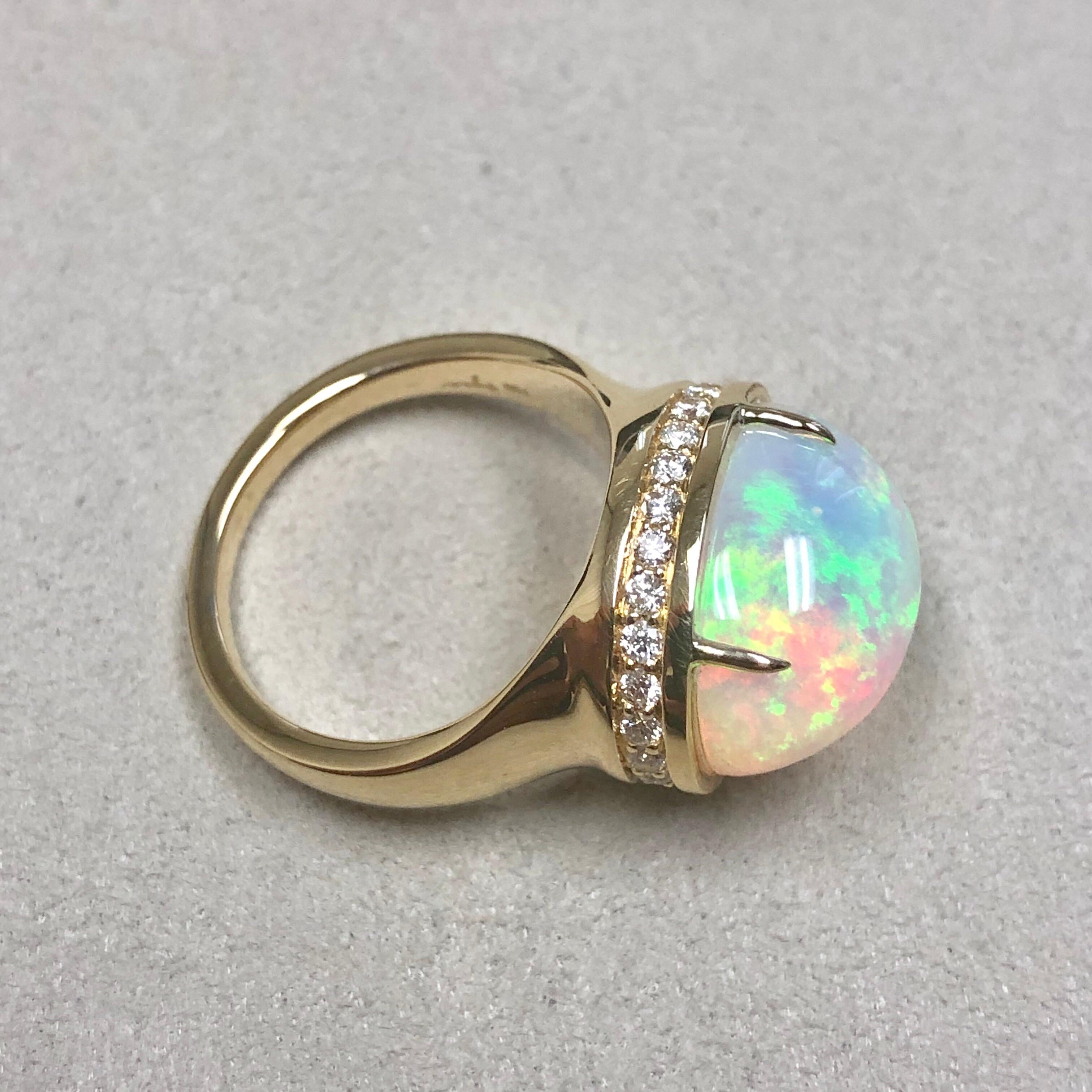 Created in 18 karat yellow gold
Ethiopian Opal 6 cts approx
Champagne diamonds 0.40 cts approx
Ring size US 6.5, can be sized
One of a kind