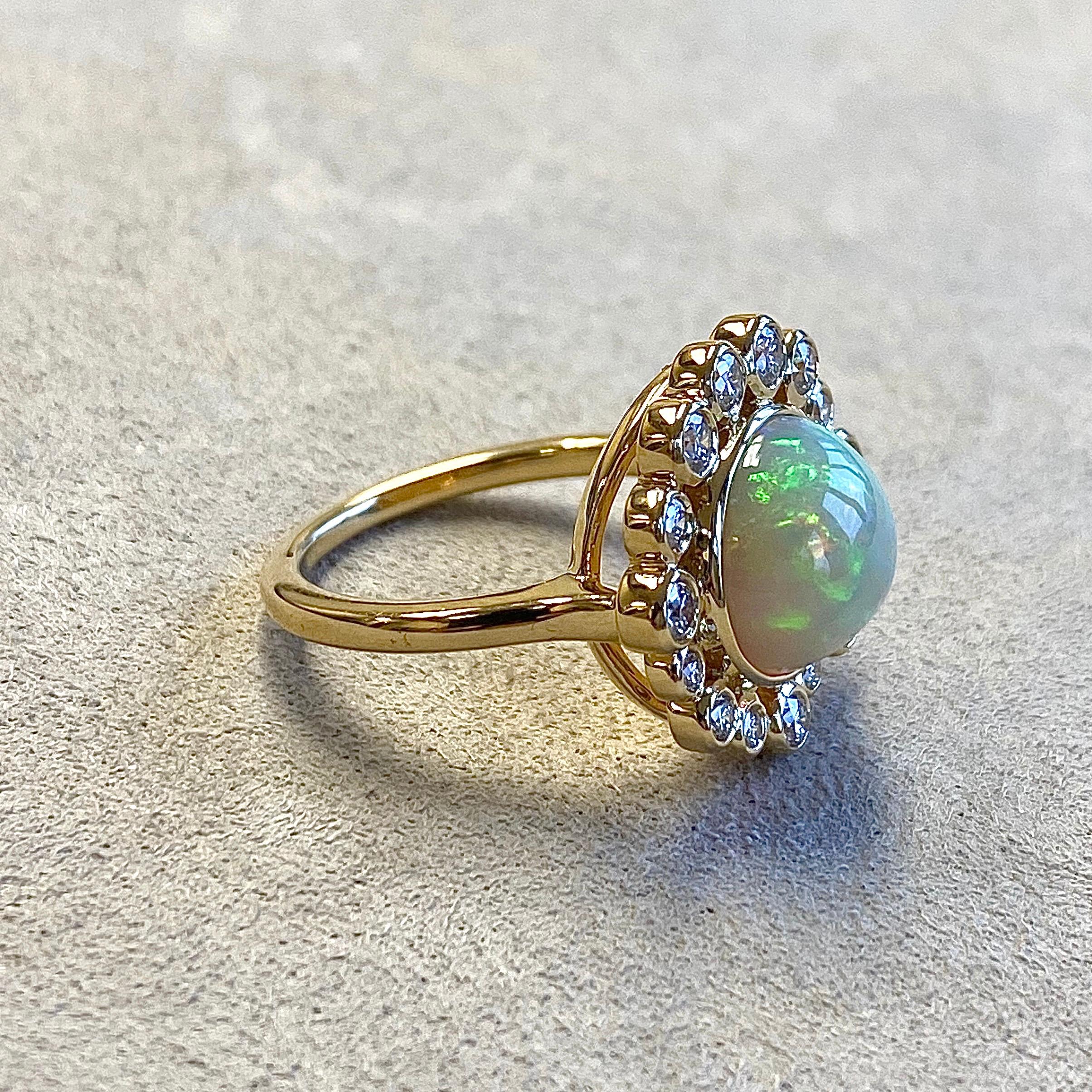 Created in 18 karat yellow gold
Ethiopian Opal 3.15 carats approx.
Diamonds 0.50 carat approx.
Ring size US 6.5, can be sized
One of a kind

About the Designers ~ Dharmesh & Namrata

Drawing inspiration from little things, Dharmesh & Namrata Kothari