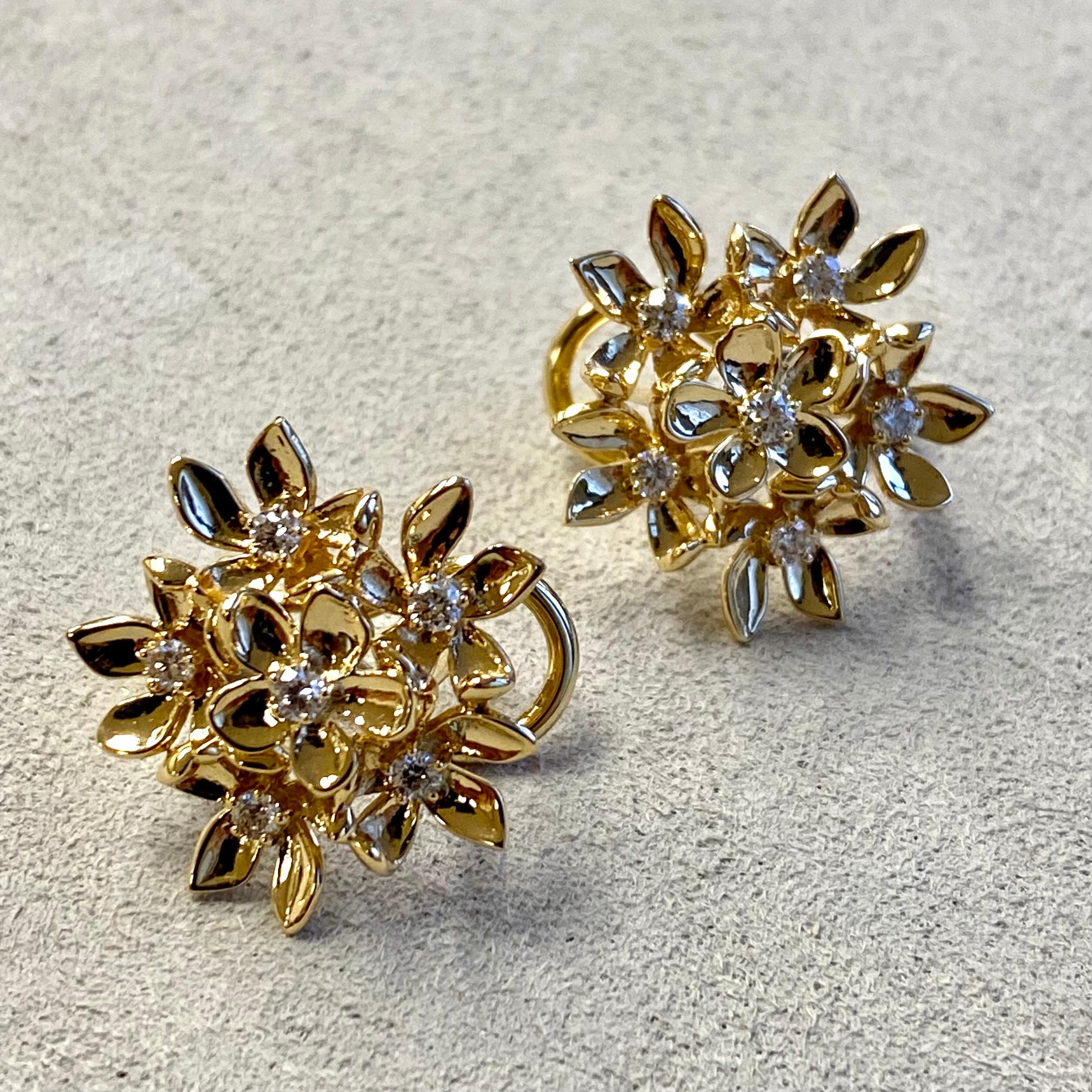 Created in 18 karat yellow gold
Diamonds 0.35 carat approx.
Omega clip-backs & posts
Limited Edition

Adorn yourself with these breathtaking Candy Blue Topaz and Moon Quartz earrings, handcrafted in 18 karat yellow gold and encrusted with 0.35