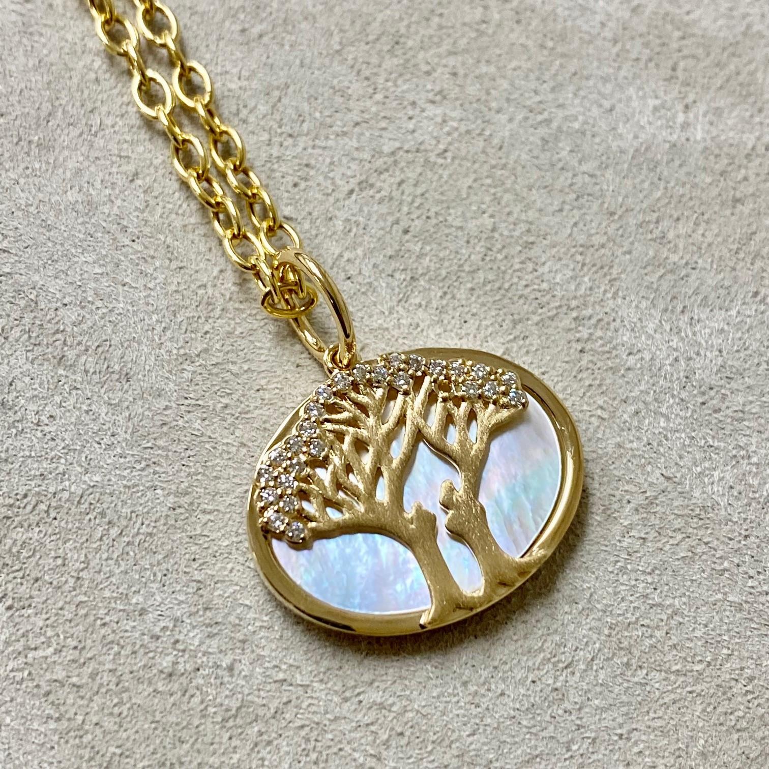 Created in 18 karat yellow gold
Mother of pearl 4.50 carats approx.
Champagne diamonds 0.10 carat approx.
Limited edition
Chain sold separately

 About the Designers ~ Dharmesh & Namrata

Drawing inspiration from little things, Dharmesh & Namrata