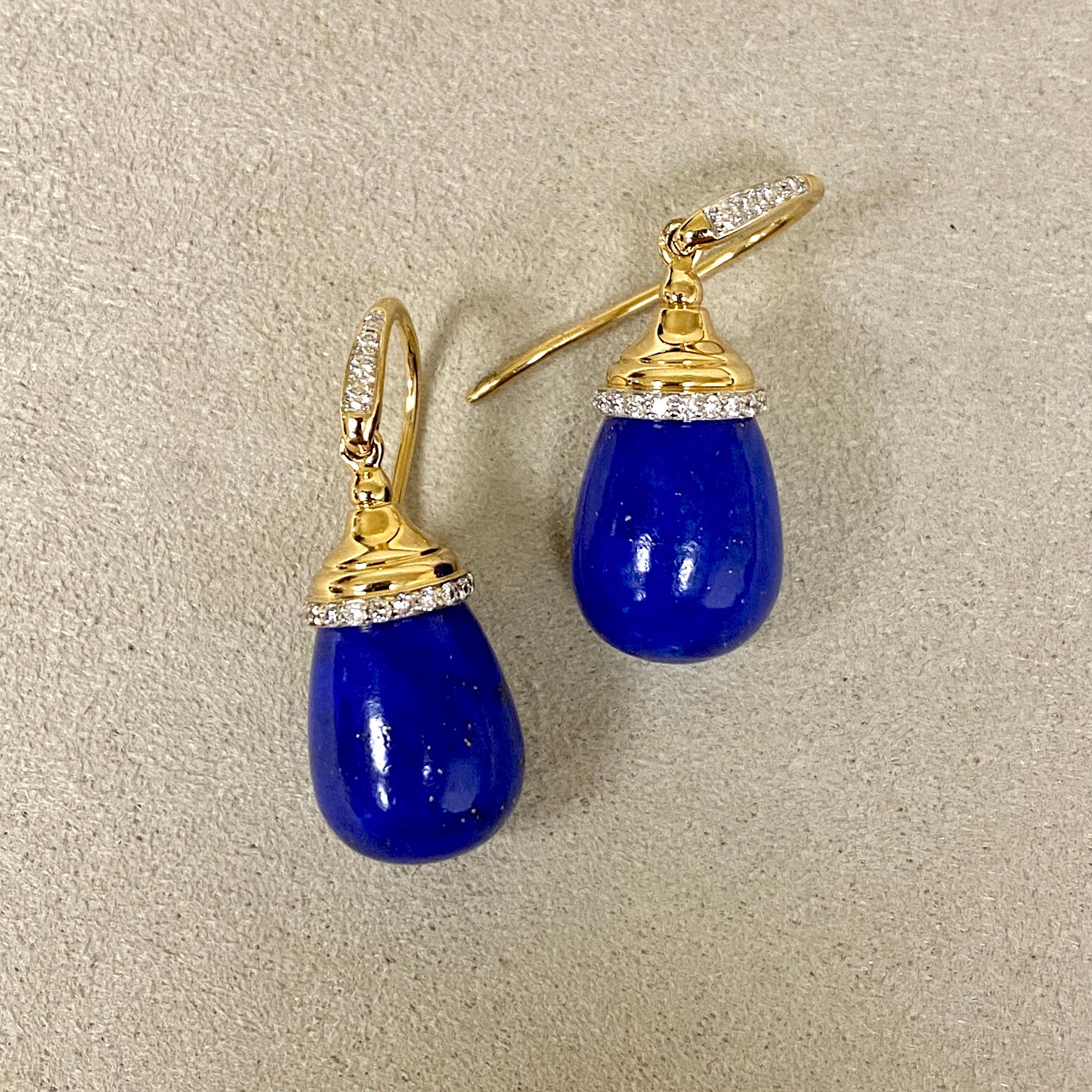 Created in 18kyg
Lapis Lazuli 20 cts approx
Diamonds 0.20 ct approx

These exquisite earrings are a mesmerizing confection of fine 18K yellow gold, 20 carat lapis lazuli and 0.20 carat diamond accents. Delicate candy blue topaz and moon quartz