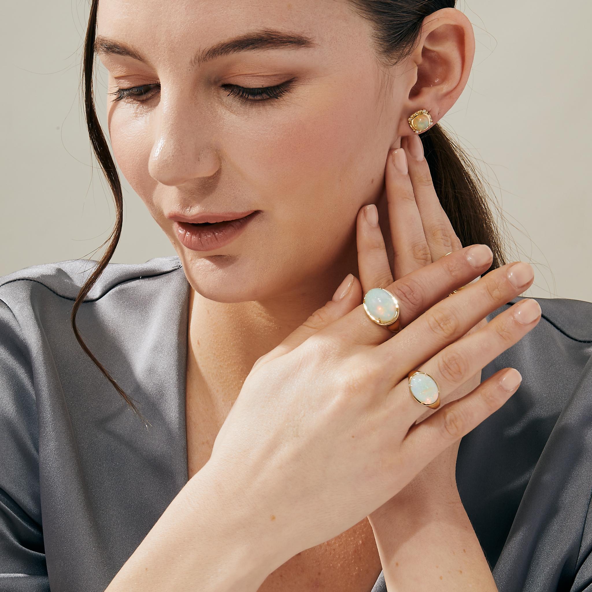 Created in 18 karat yellow gold
Ethiopian Opal 9.50 carats approx.
Diamonds 0.45 carat approx.
Ring size US 7, can be sized
Limited edition

Crafted with 18 karat yellow gold, this limited edition ring features a commanding Ethiopian Opal of 9.50