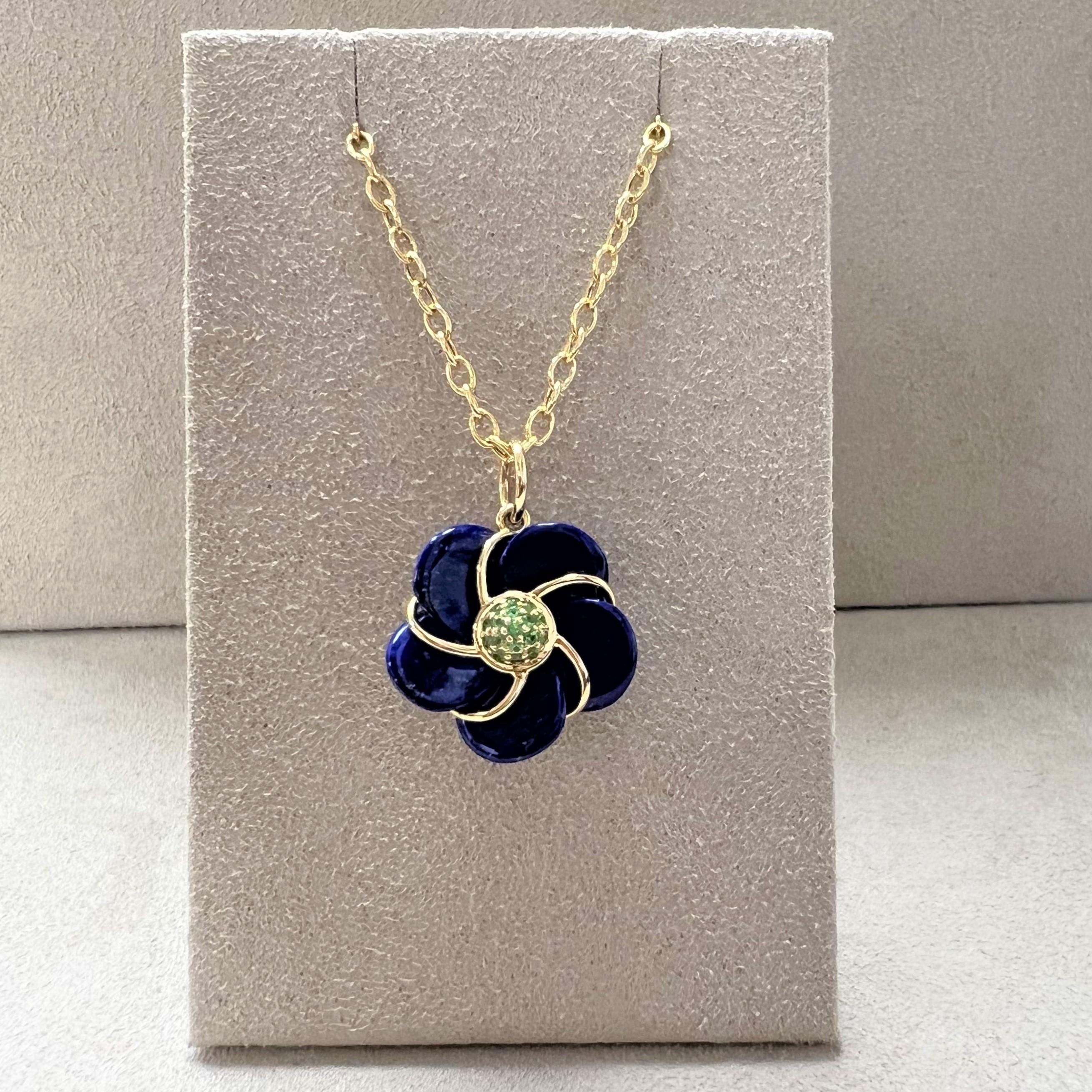 Created in 18 karat yellow gold
Lapis Lazuli 13.80 carats approx.
Tsavorites 0.25 carat approx.
Hand-carved pendant
Limited edition
Chain sold separately


 About the Designers ~ Dharmesh & Namrata

Drawing inspiration from little things, Dharmesh &