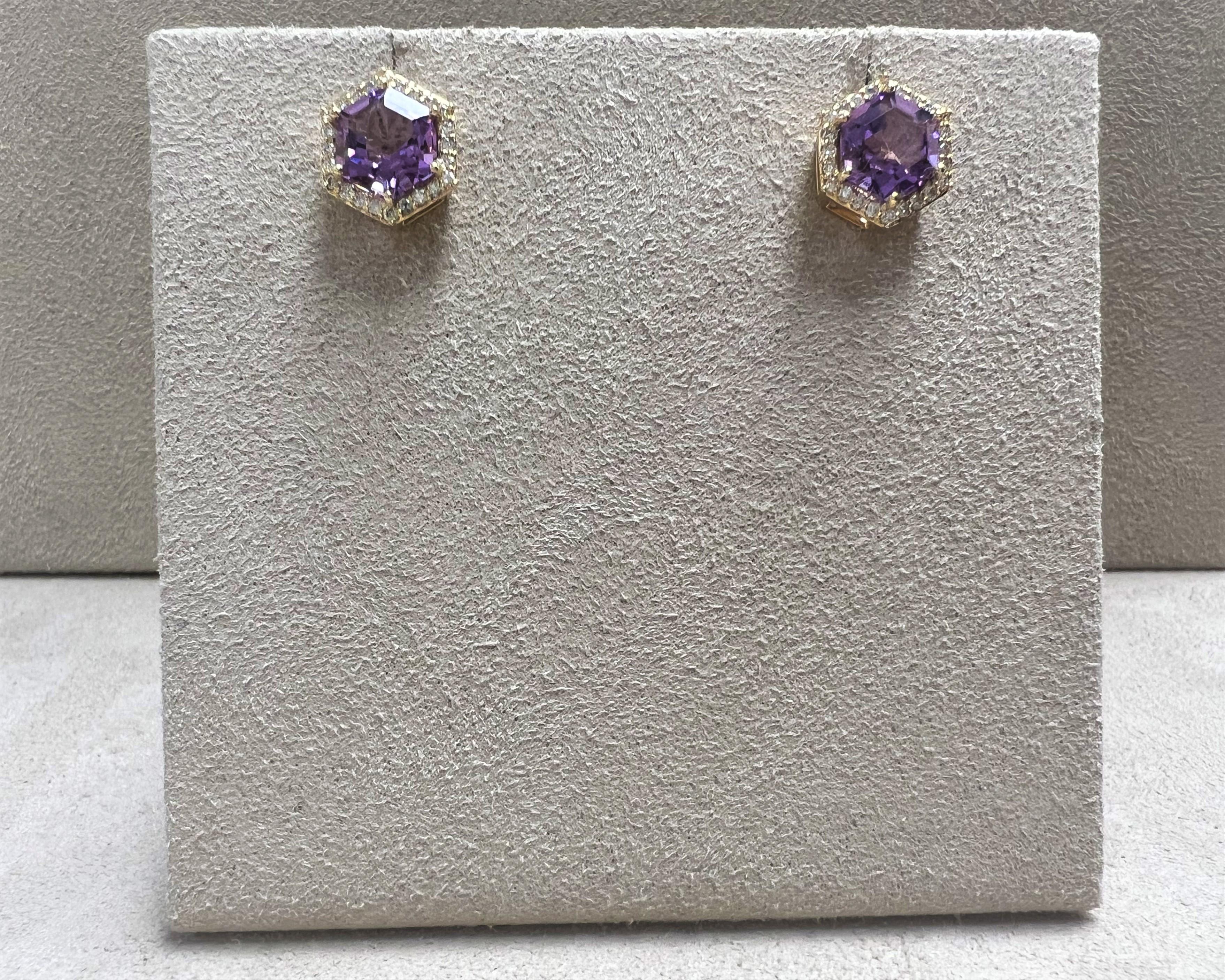 Created in 18 karat yellow gold
Amethyst 2.50 carats approx.
Diamonds 0.20 carat approx.
Post backs for pierced ears
Limited Edition

Sculpted from 18 karat yellow gold, these limited edition earrings feature a royal Amethyst—its estimated 2.5