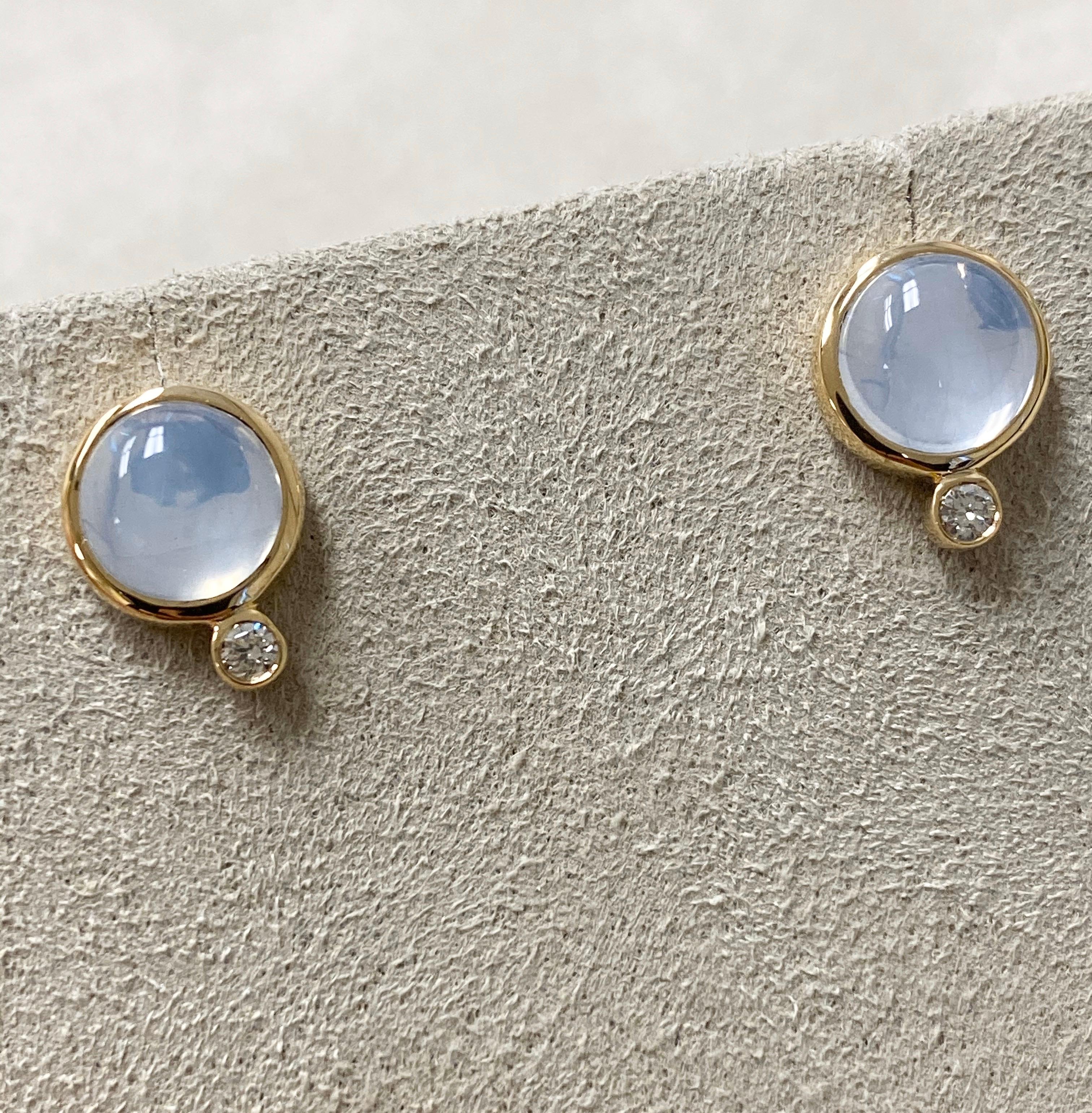 Created in 18 karat yellow gold
Moon quartz 4 cts approx
Diamonds 0.10 ct approx
Can be worn at different angles
Limited edition

These exquisite Candy Blue Topaz & Diamond Earrings are a rare sight. The limited edition design is delicately crafted