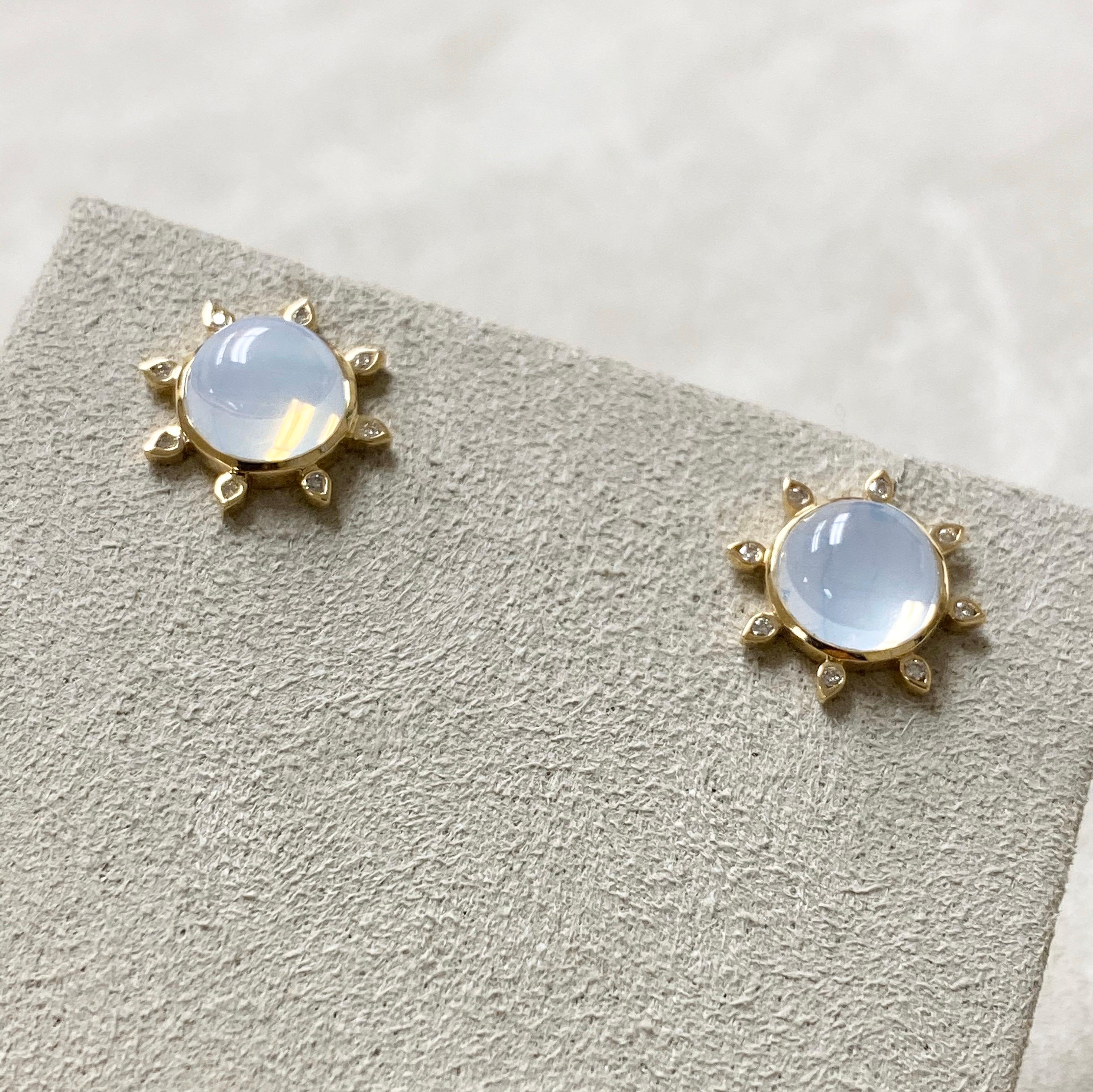 Created in 18 karat yellow gold
Moon quartz cabochons 4 cts approx
Diamonds 0.10 ct approx
Limited edition

These limited edition earrings feature glittering diamond accents illuminated by the luminous radiance of majestic candy blue topaz quartz