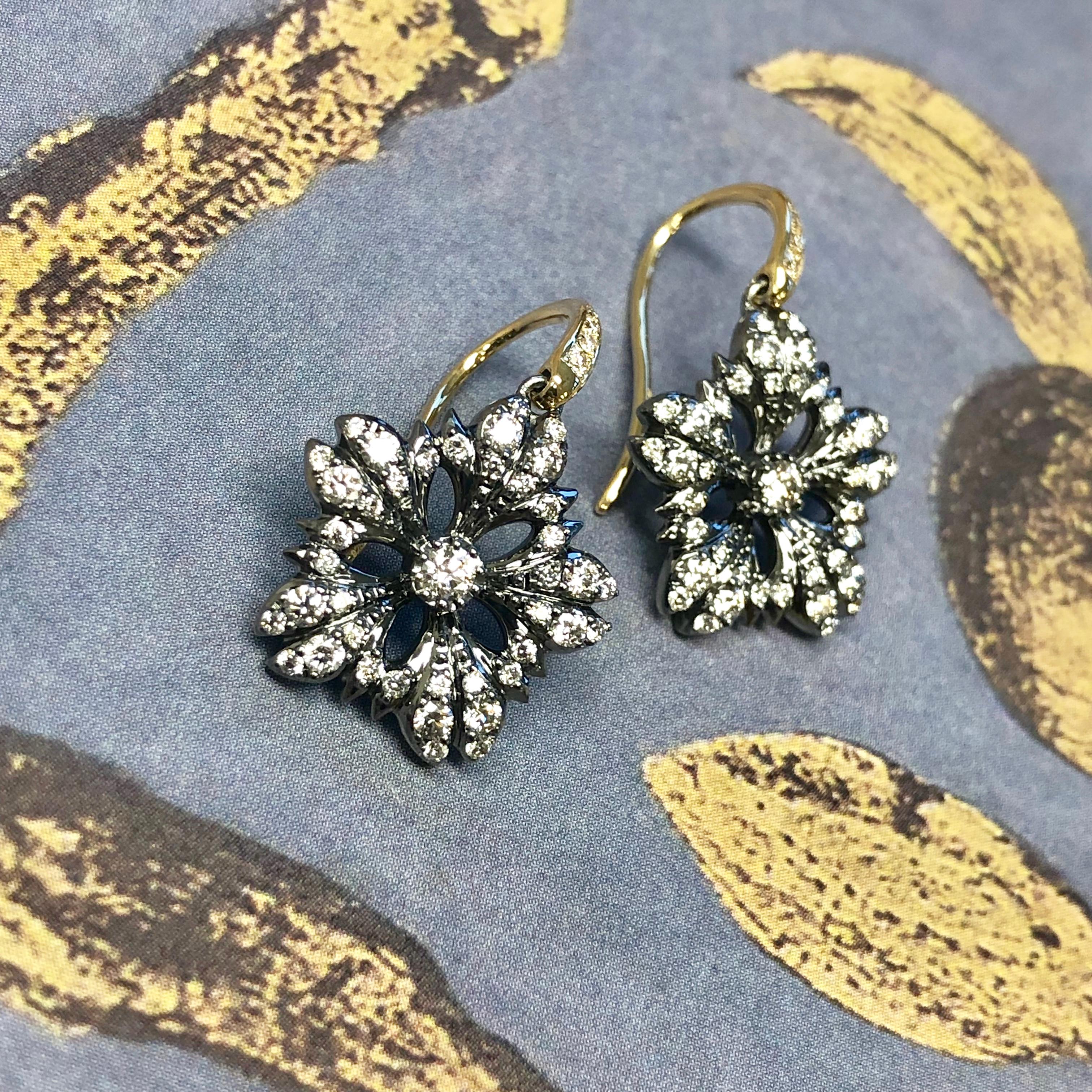 Created in oxidized silver with 18 karat yellow gold accents
Bright diamonds 0.80 ct approx
Limited edition

These Flower Earrings with Diamonds are crafted with a delectable blend of oxidized silver and 18 karat yellow gold accents, to give them an