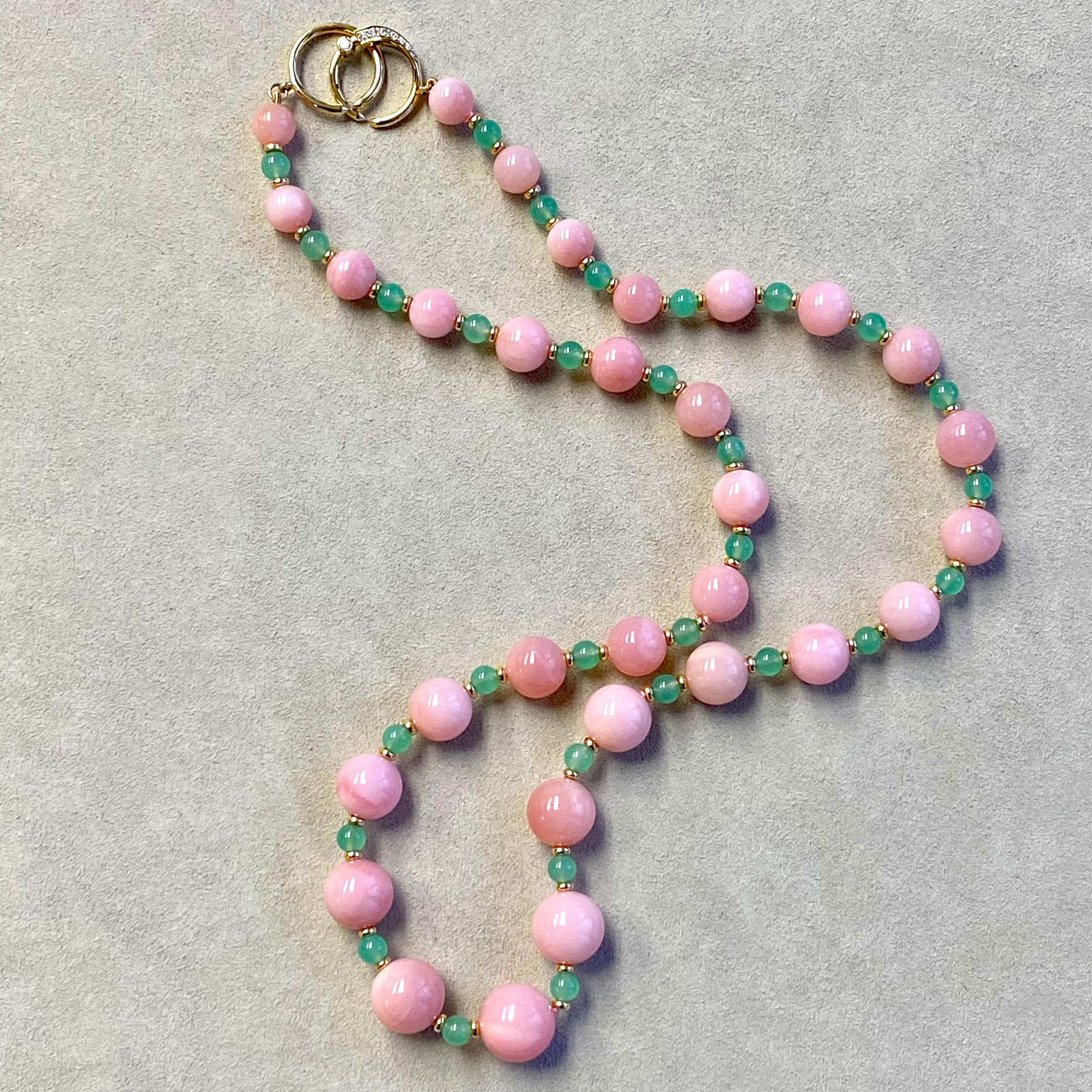 Created in 18 karat yellow gold
23 inch length
Pink Opal graduating beads  195 carats approx.
Chrysoprase beads 25 carats approx.
18kyg roundels 
18kyg circle clasp
Strung on silk
Limited edition

About the Designers

Drawing inspiration from little