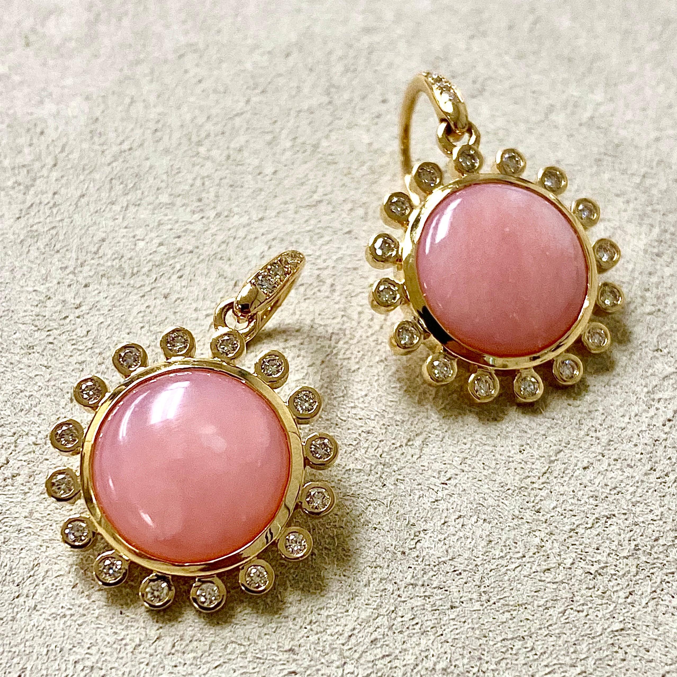 Created in 18kyg
Pink Opals 6 cts approx
Diamonds 0.40 ct approx
One of a kind

Designed to evoke both timeless sophistication and modern vibrancy, these one-of-a-kind earrings boast 6 carats of pink opals and 0.40 carats of diamonds set in