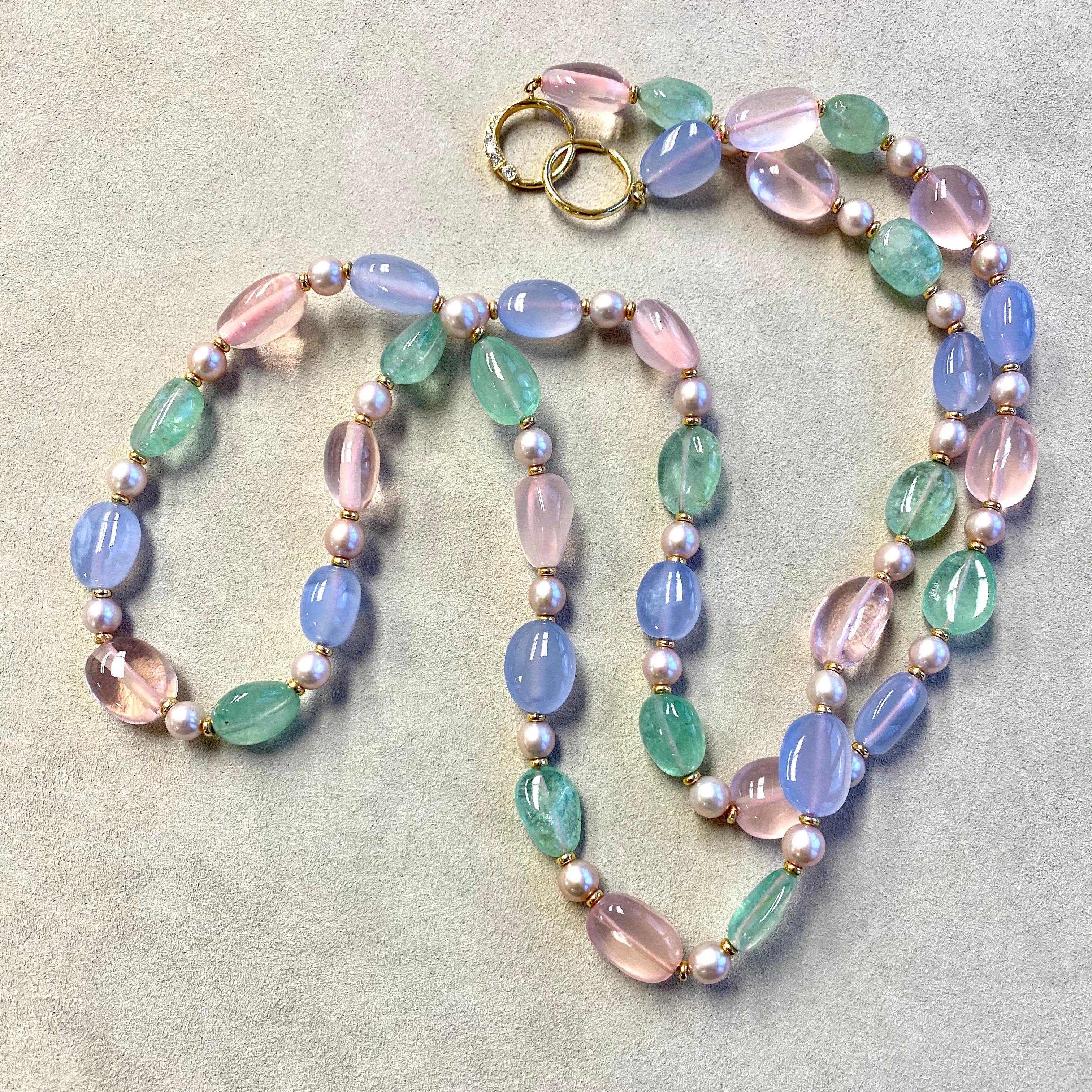 18 karat yellow gold
36 inch
Rose Quartz, Emerald, Blue Chalcedony Beads 410 carats approx.
Freshwater Pearls 70 carats approx.
18k yellow gold roundels 
18k yellow gold circle clasp
Strung on silk
Limited edition

About the Designers

Drawing