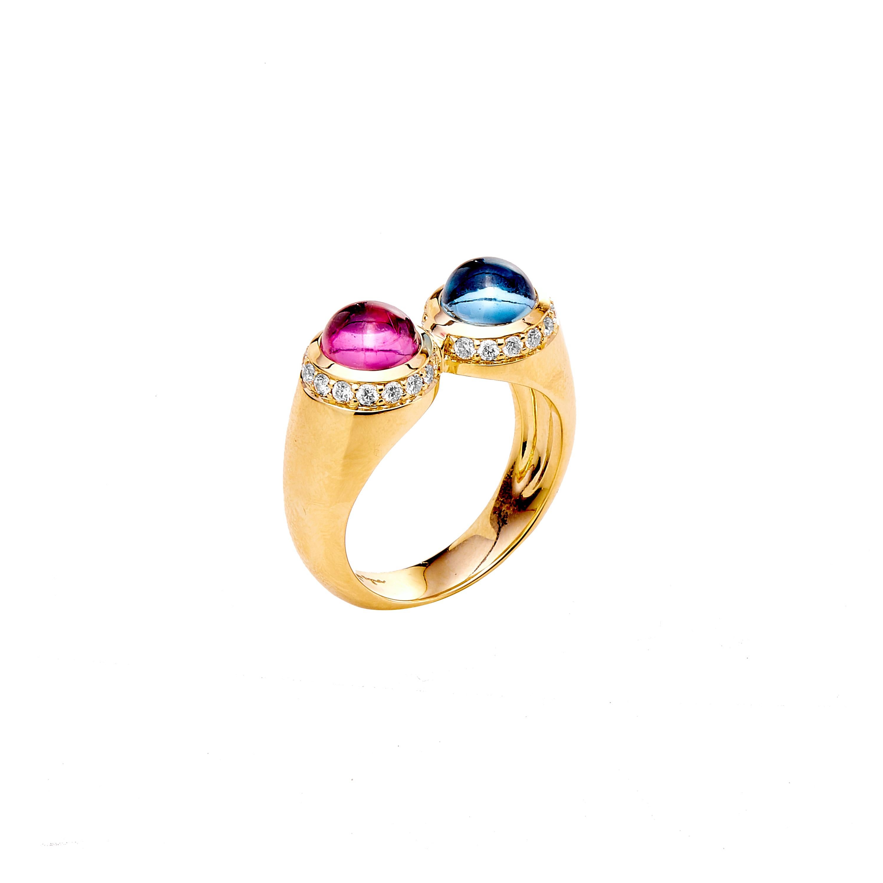 Created in 18 karat yellow gold
Rubellite 1.4 carats approx.
Blue topaz 1.7 carats approx.
Diamond 0.4 carat approx.
Ring size - US 6.5, can be sized as per request
Limited edition

Encompassing 18 karat yellow gold, this limited-edition ring