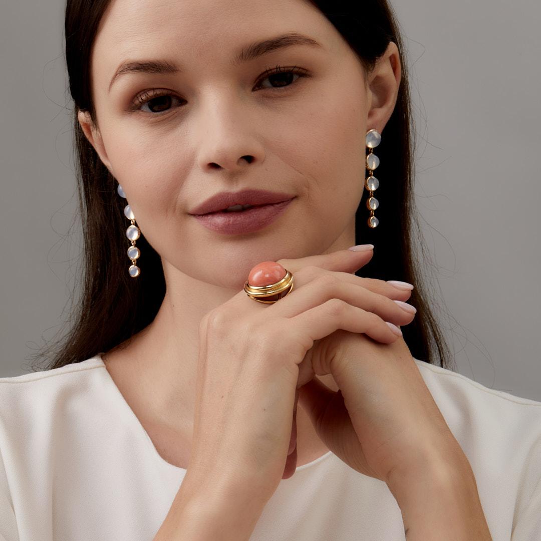 Created in 18 karat yellow gold
Natural Rare Salmon Coral 25 cts approx
Comfortable saddle within shank for easy fit
Ring size US 6.5, can be sized
One of a kind

This one-of-a-kind ring, crafted from 18 karat yellow gold, features a Rare Salmon