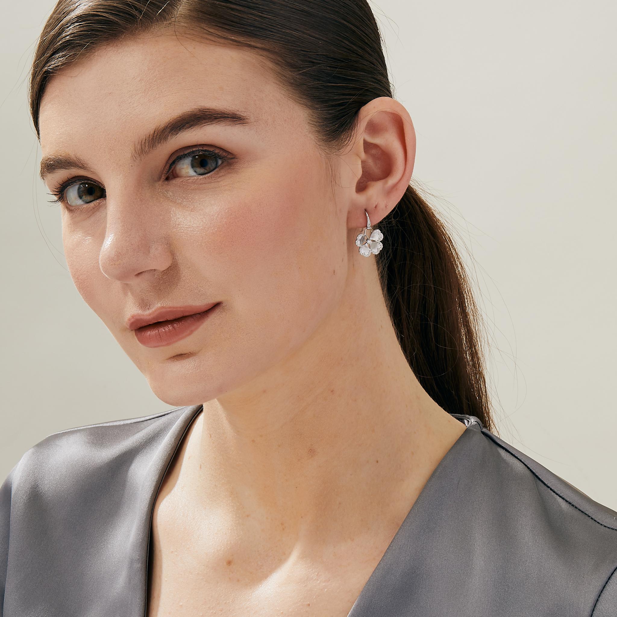 Created in 925 sterling silver
Champagne diamonds 0.45 carat approx.
French wire for pierced ears
Limited edition

Our limited edition Cosmic Gemstone Dangle Earrings are a luxurious addition to any collection. Crafted from 925 sterling silver and