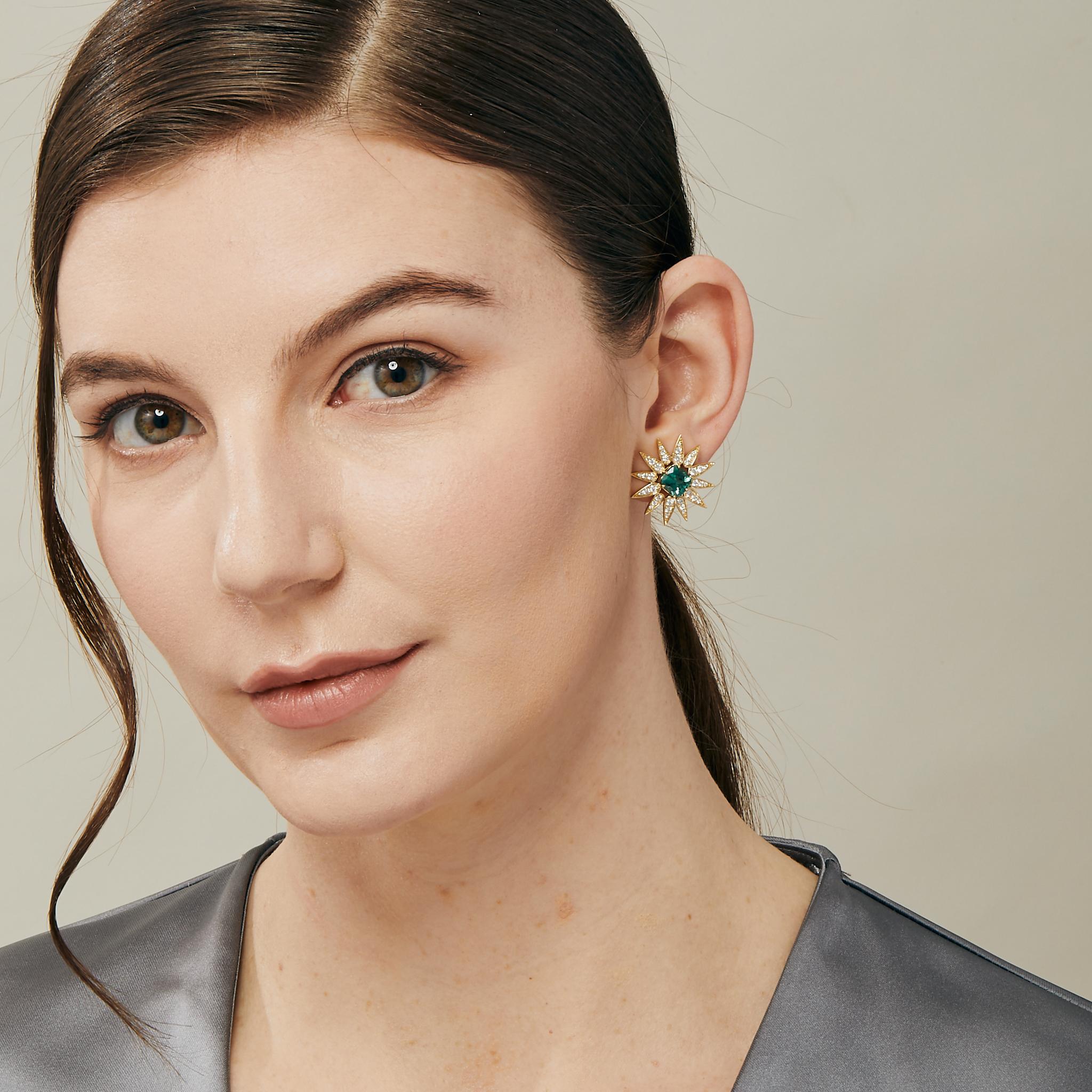 Created in 18 karat yellow gold
Green tourmaline 3.30 carats approx.
Diamonds 1.0 carat approx.
Omega clip-backs & posts
Limited Edition

Showcase your elegance and sophistication with our exclusive, limited edition Cosmic Gemstone Dangle Earrings.